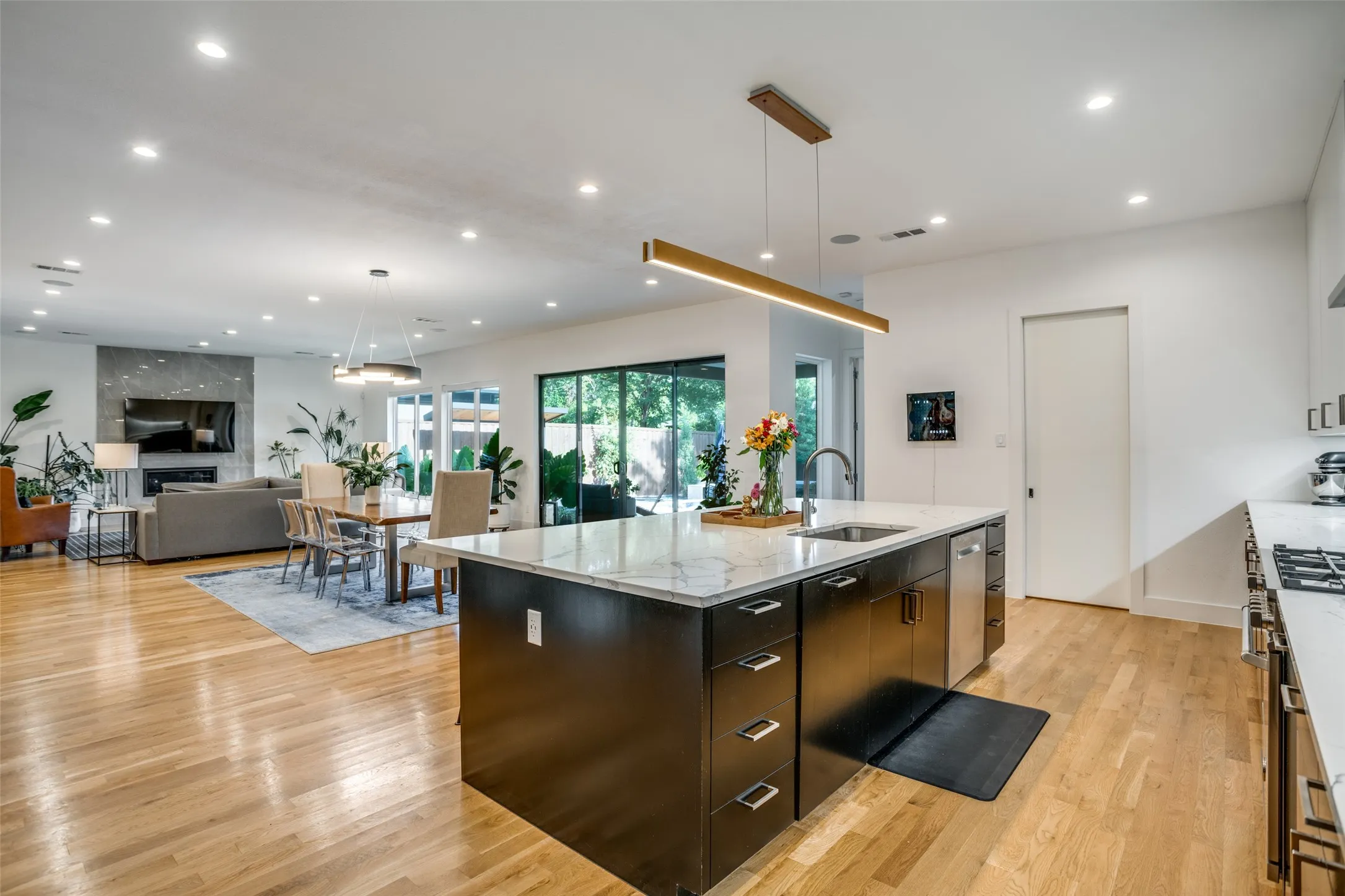 Kitchen with open floor plan and a great view of the outdoor patio
