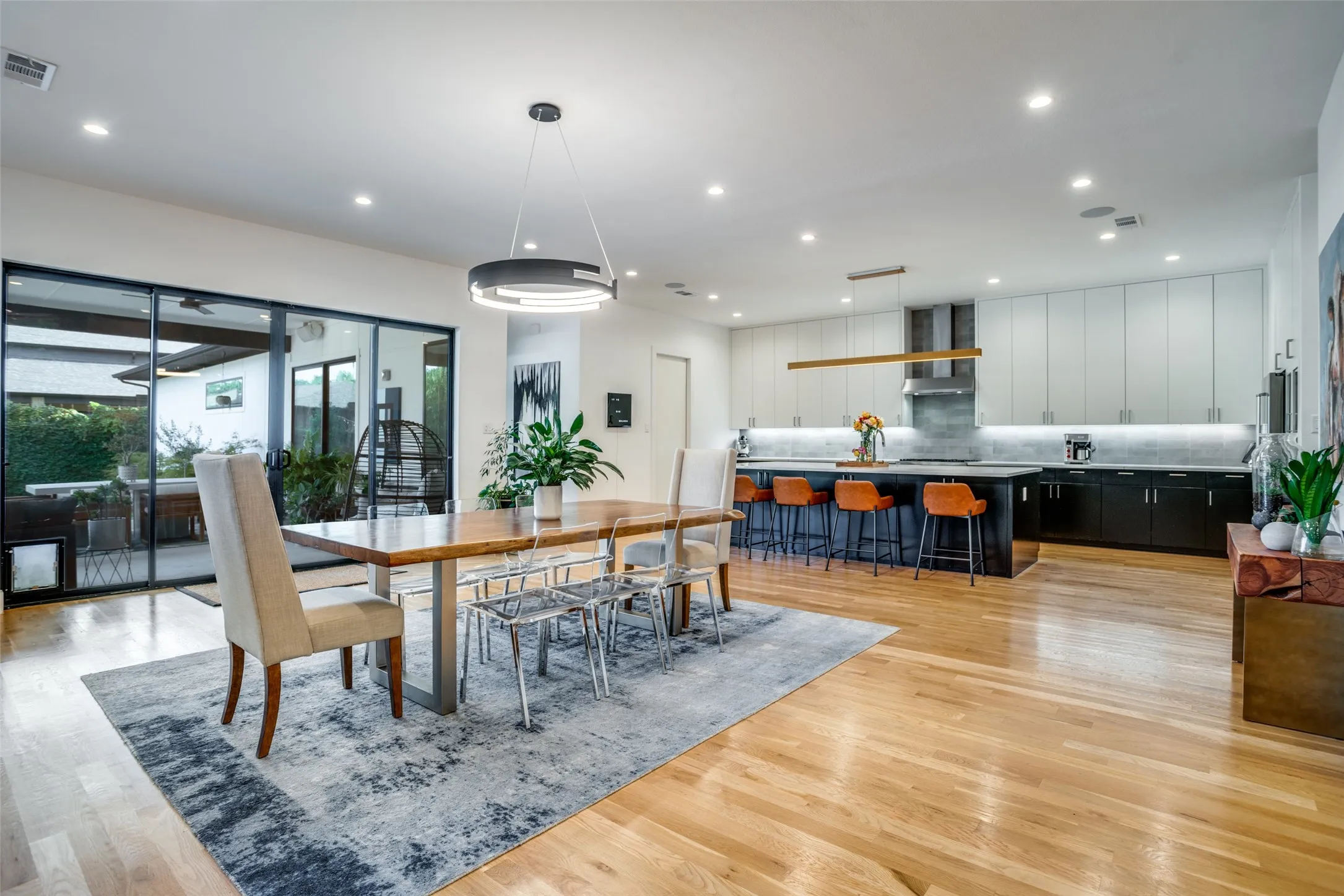 Dining room featuring recessed lighting and light wood finished floors