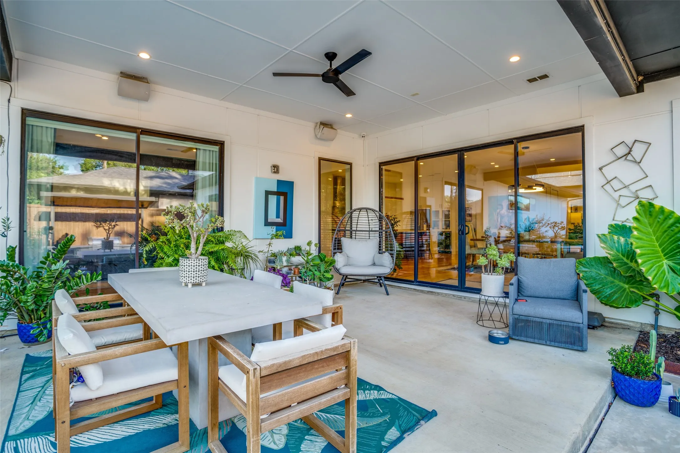View of patio featuring a ceiling fan and outdoor dining space