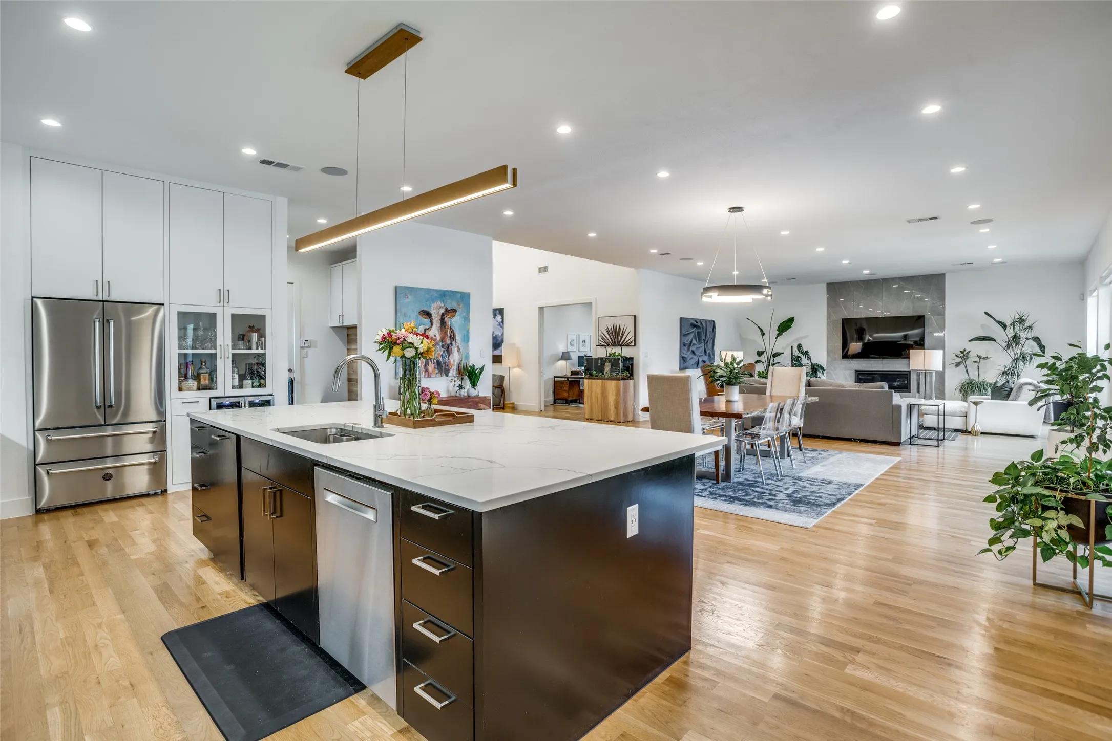 Kitchen overlooks the dining and living space so you don't miss a thing while entertaining.