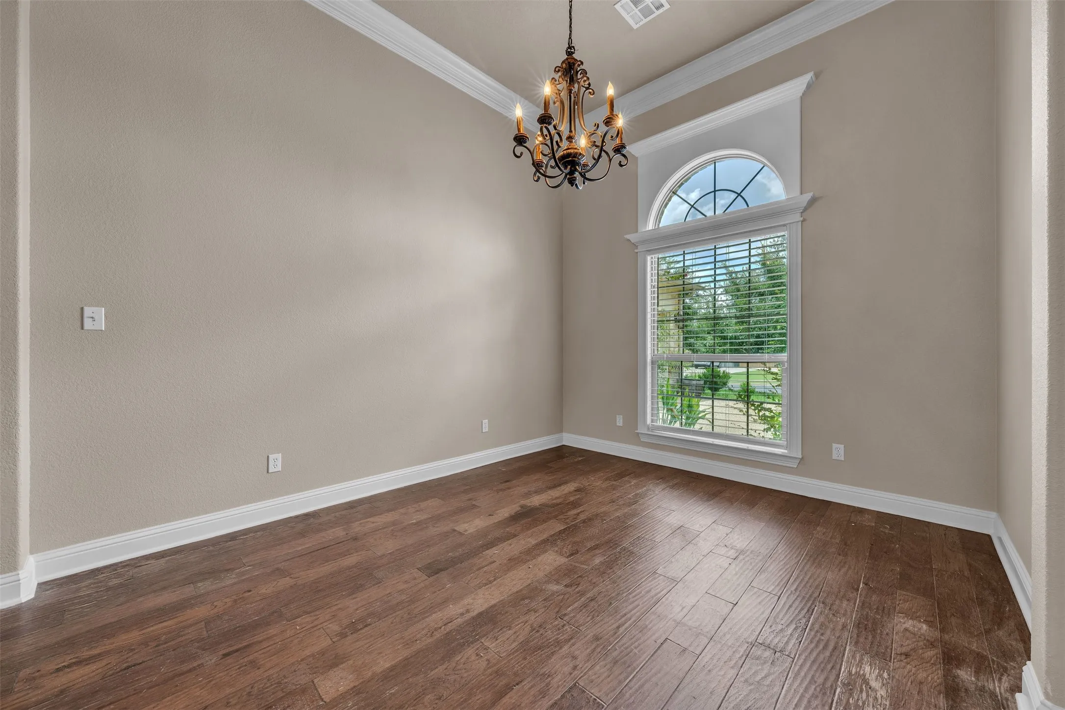 Hardwood-finish flooring complementing a neutral wall palette