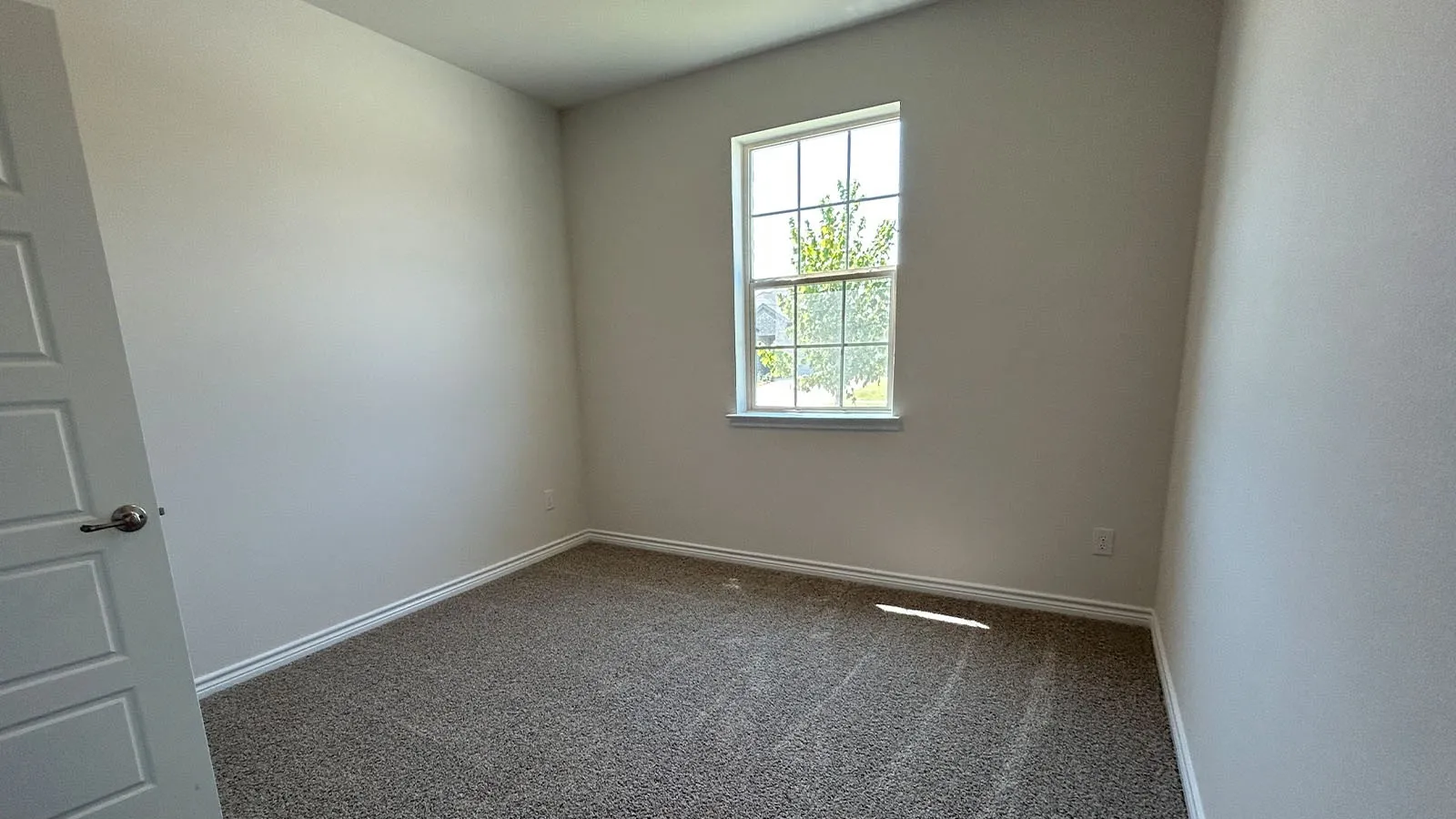 Neutral tone walls and carpeting