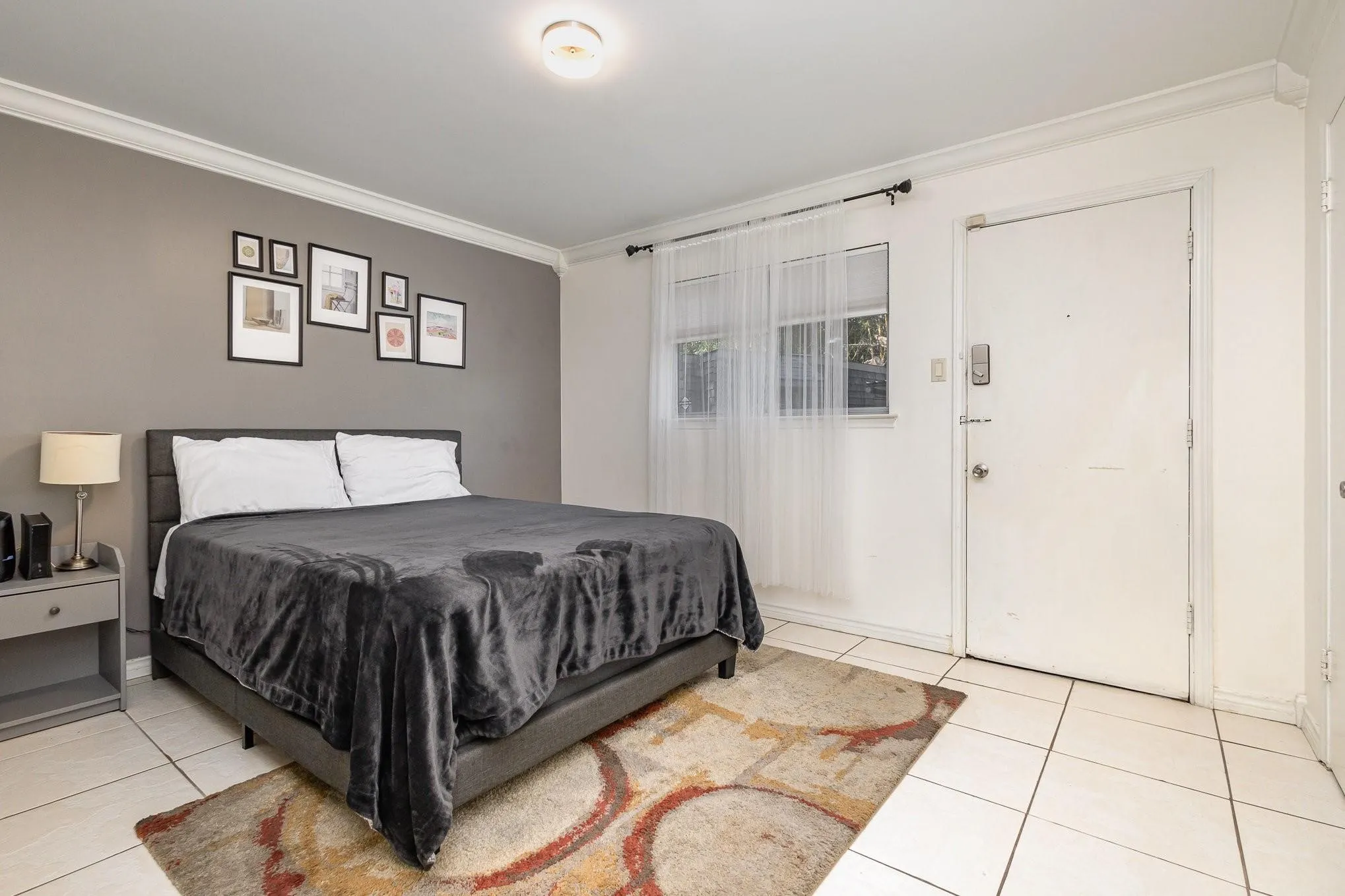 Interior room featuring crown molding and a neutral color palette