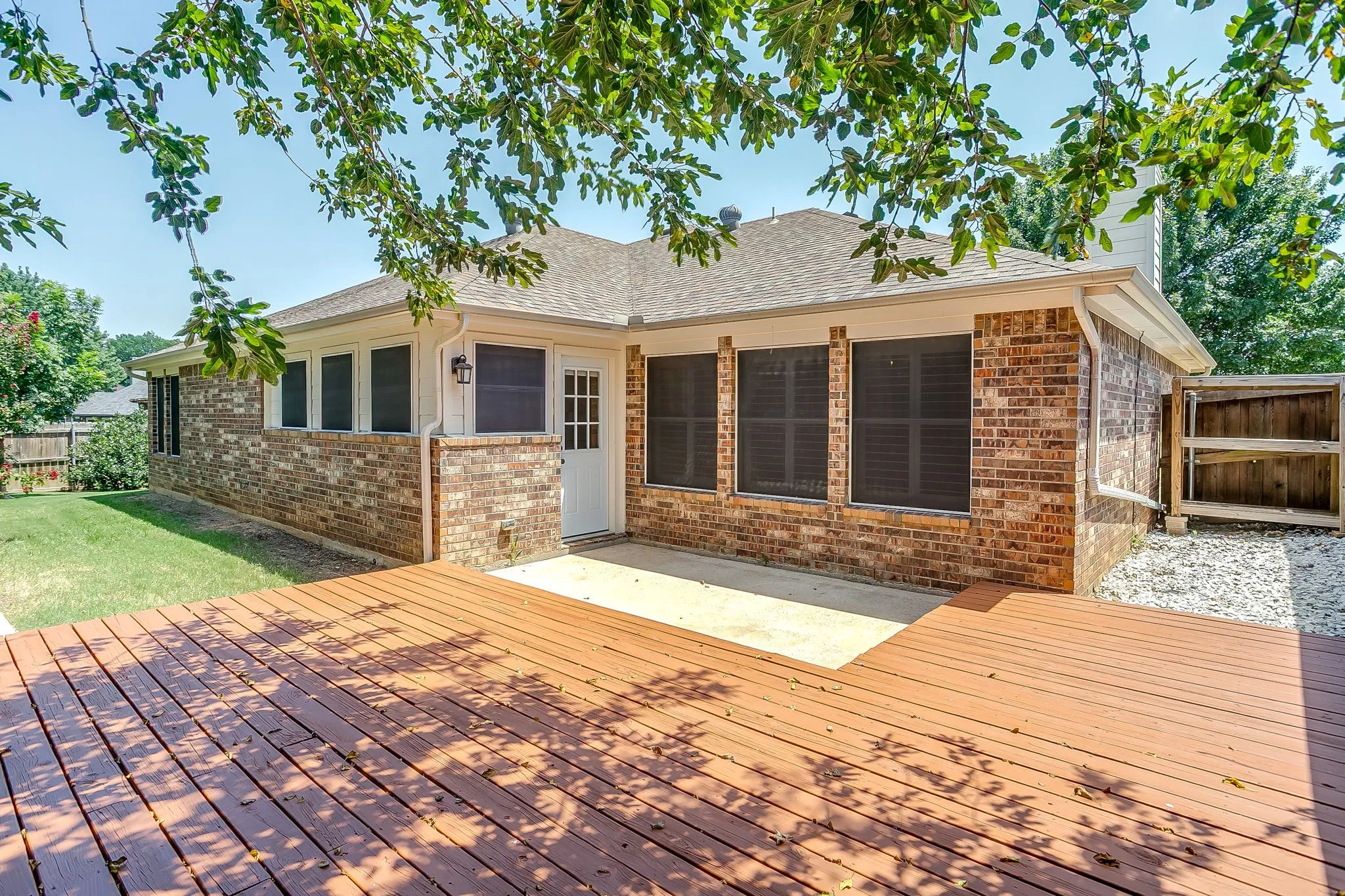 Backyard and recently stained deck