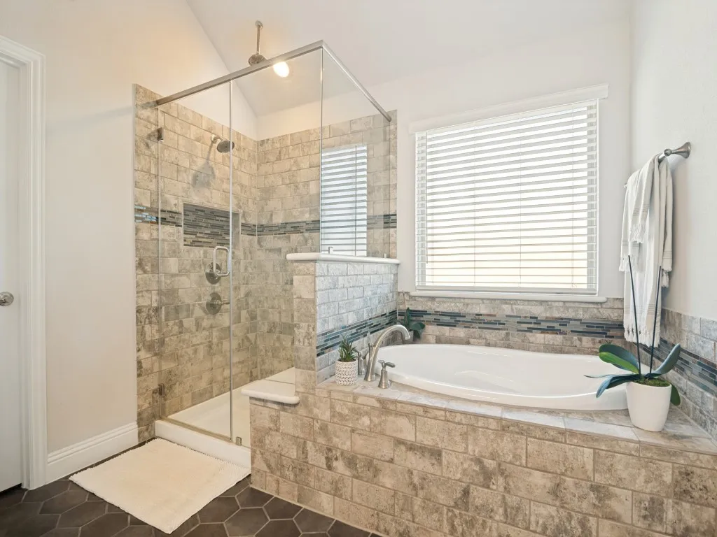 Upstairs, dual shower heads, garden bath