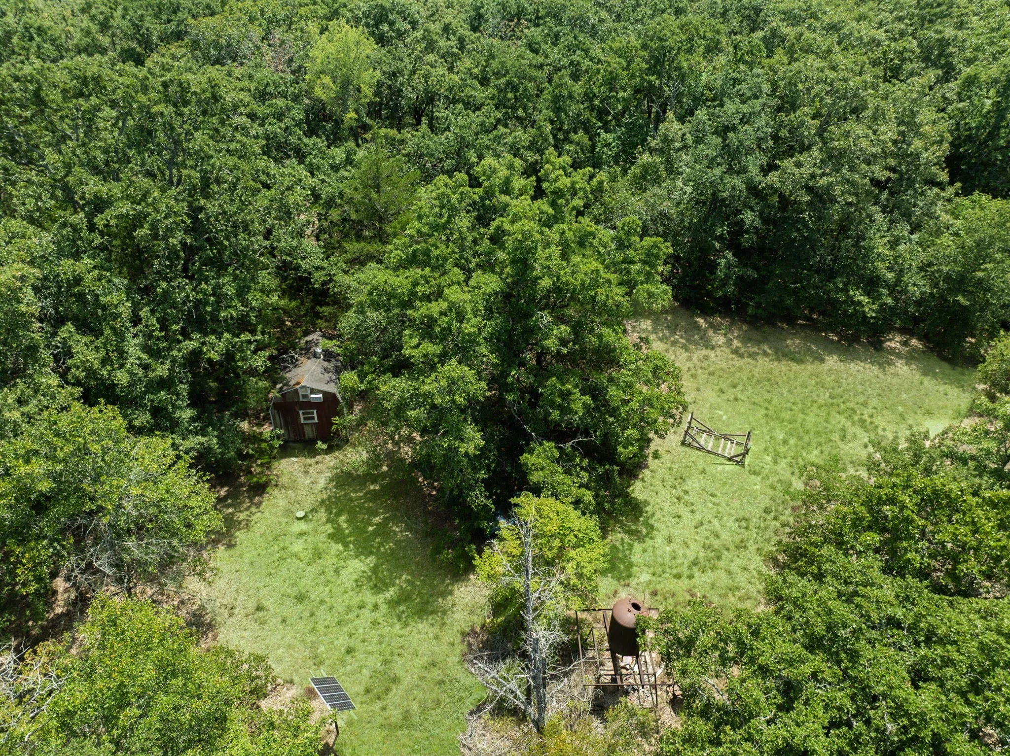 Aerial View of Shed, power pole, and well