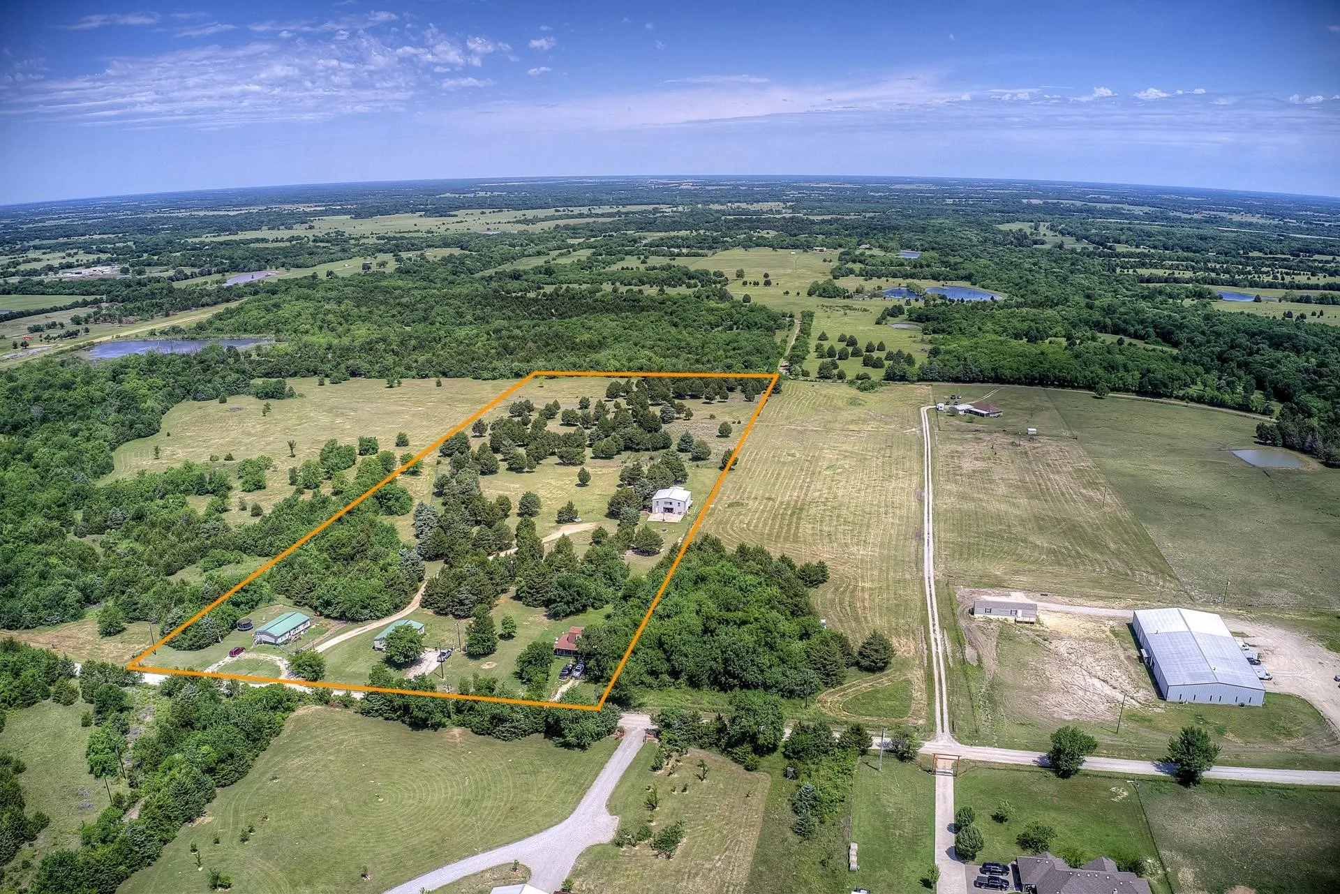 Property has county road frontage on CR 4111 on south side and CR 4125 on north side