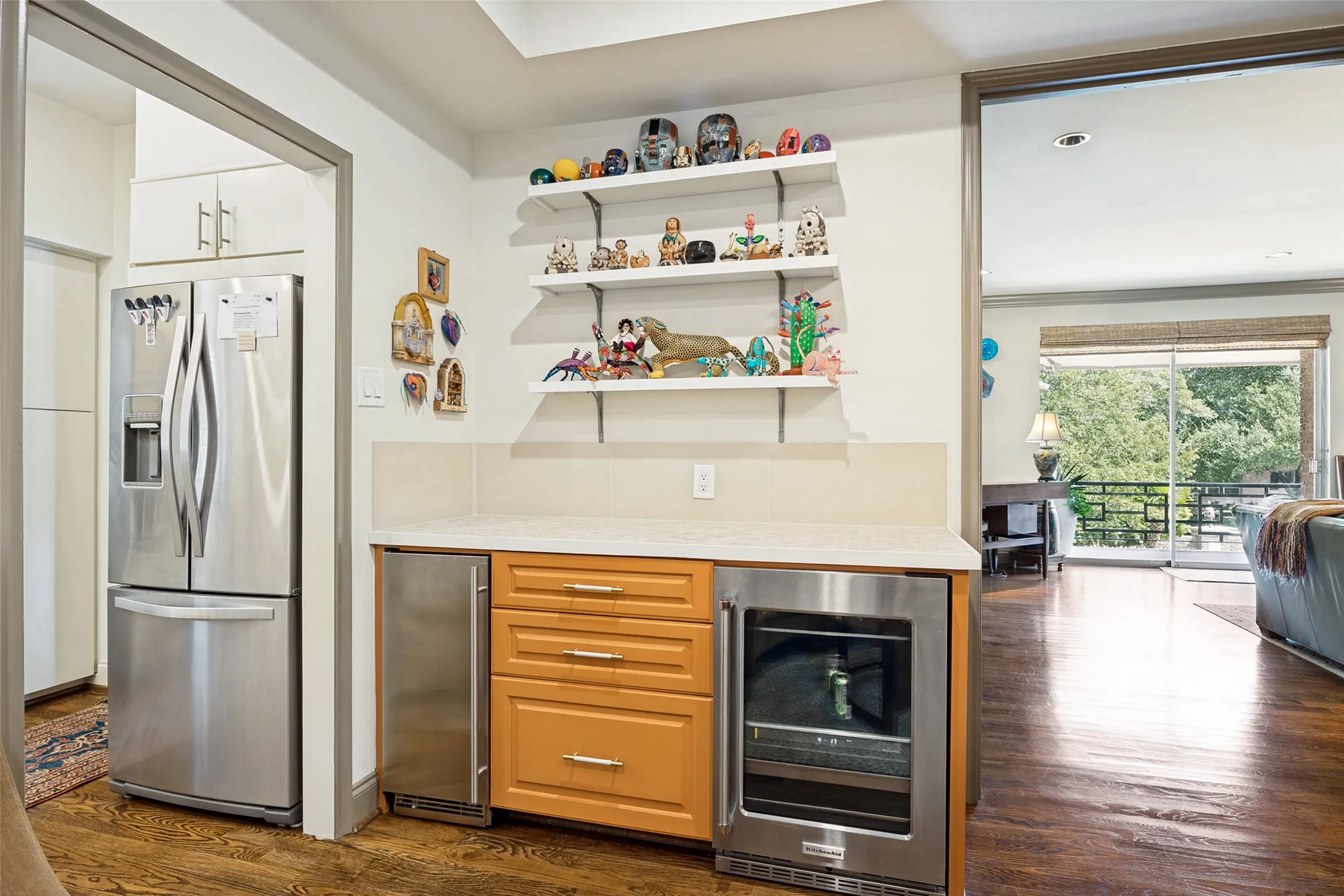 Custom built dry bar, beverage cooler and icemaker in family room