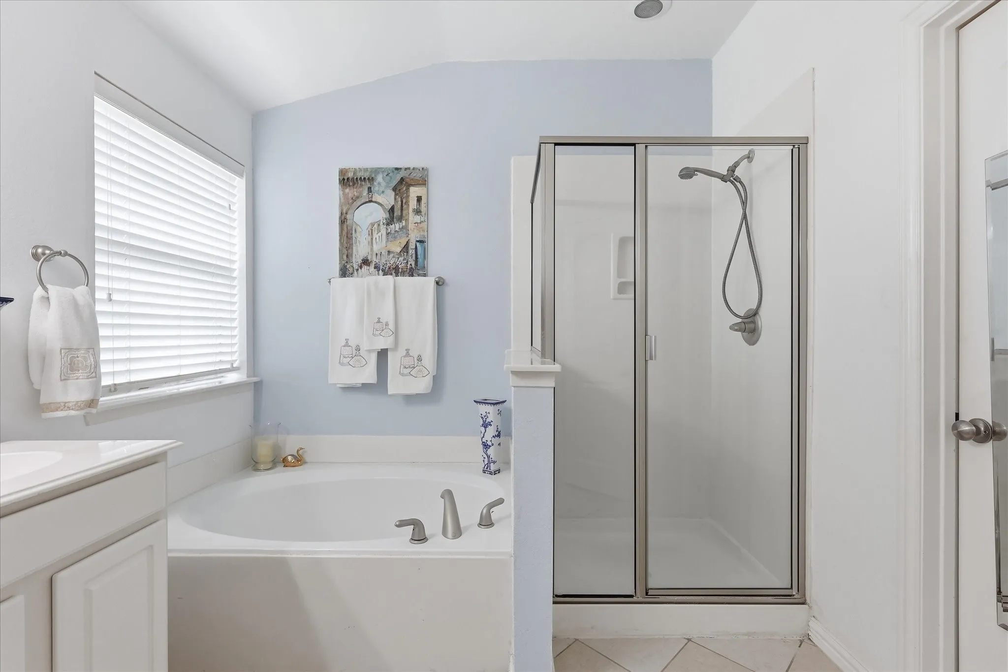 Water closet tucked behind its own door
