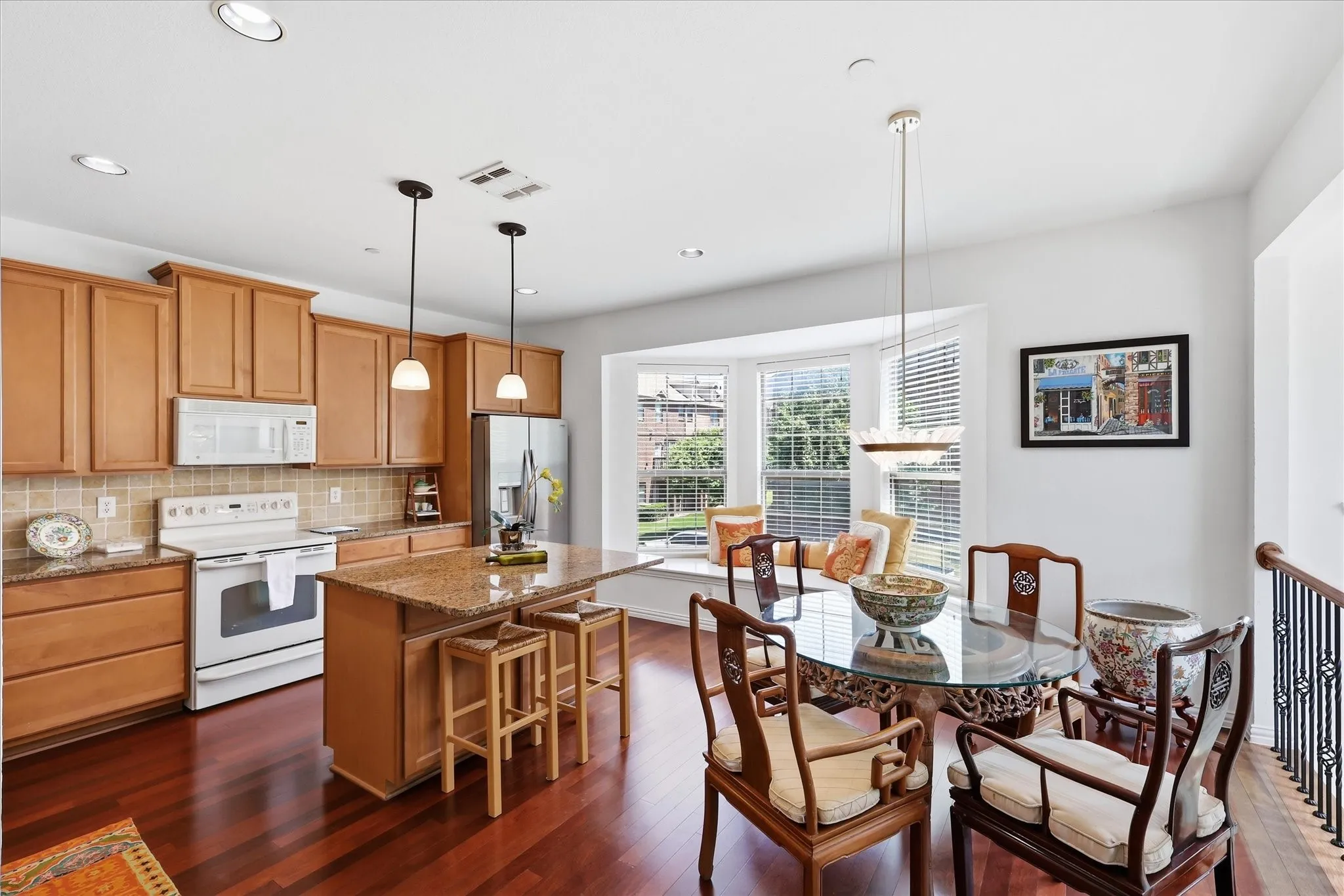 Dine in Kitchen with additional space at island and beautiful bay window