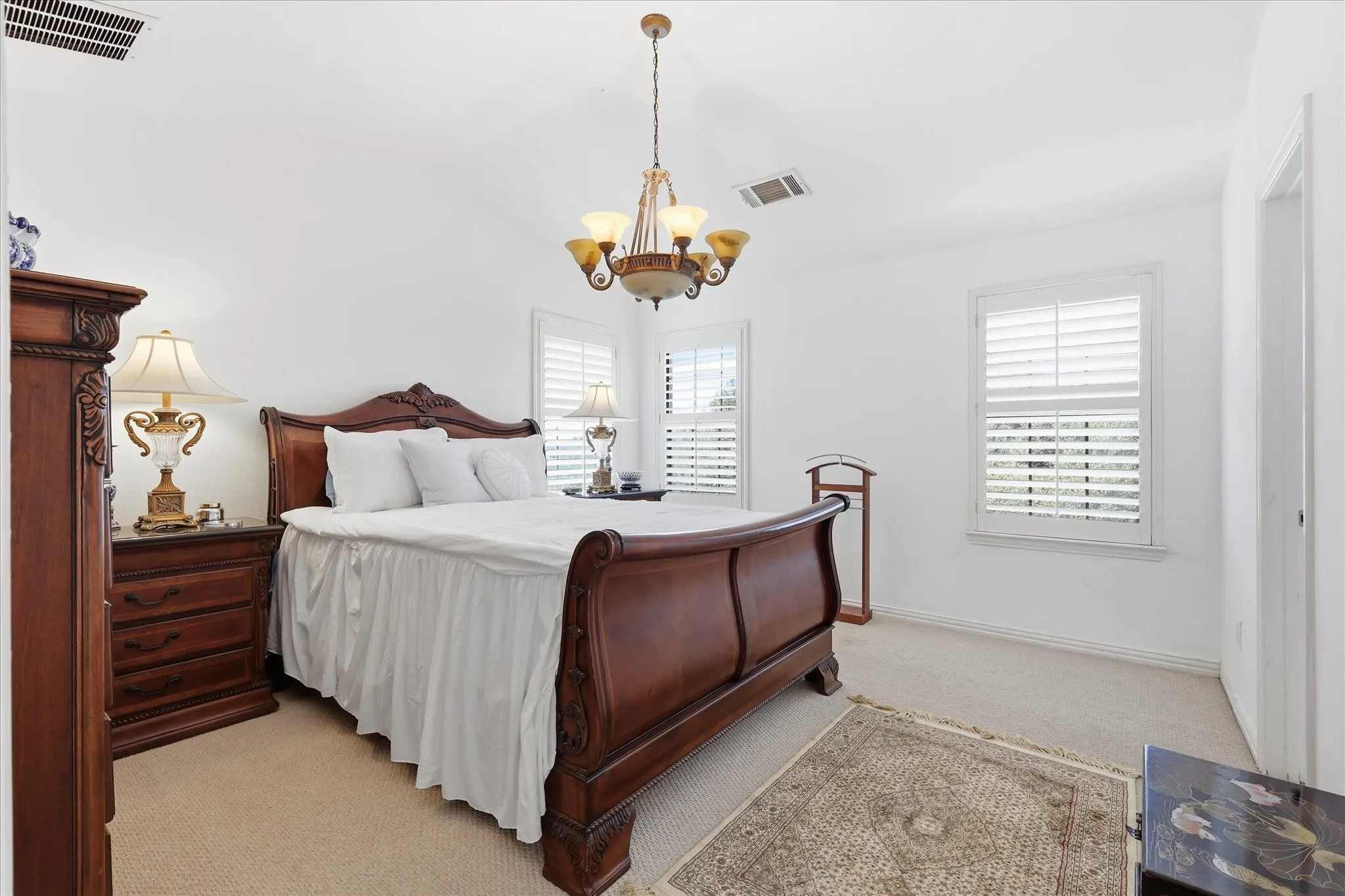 Primary with Custom Plantation Shutters
