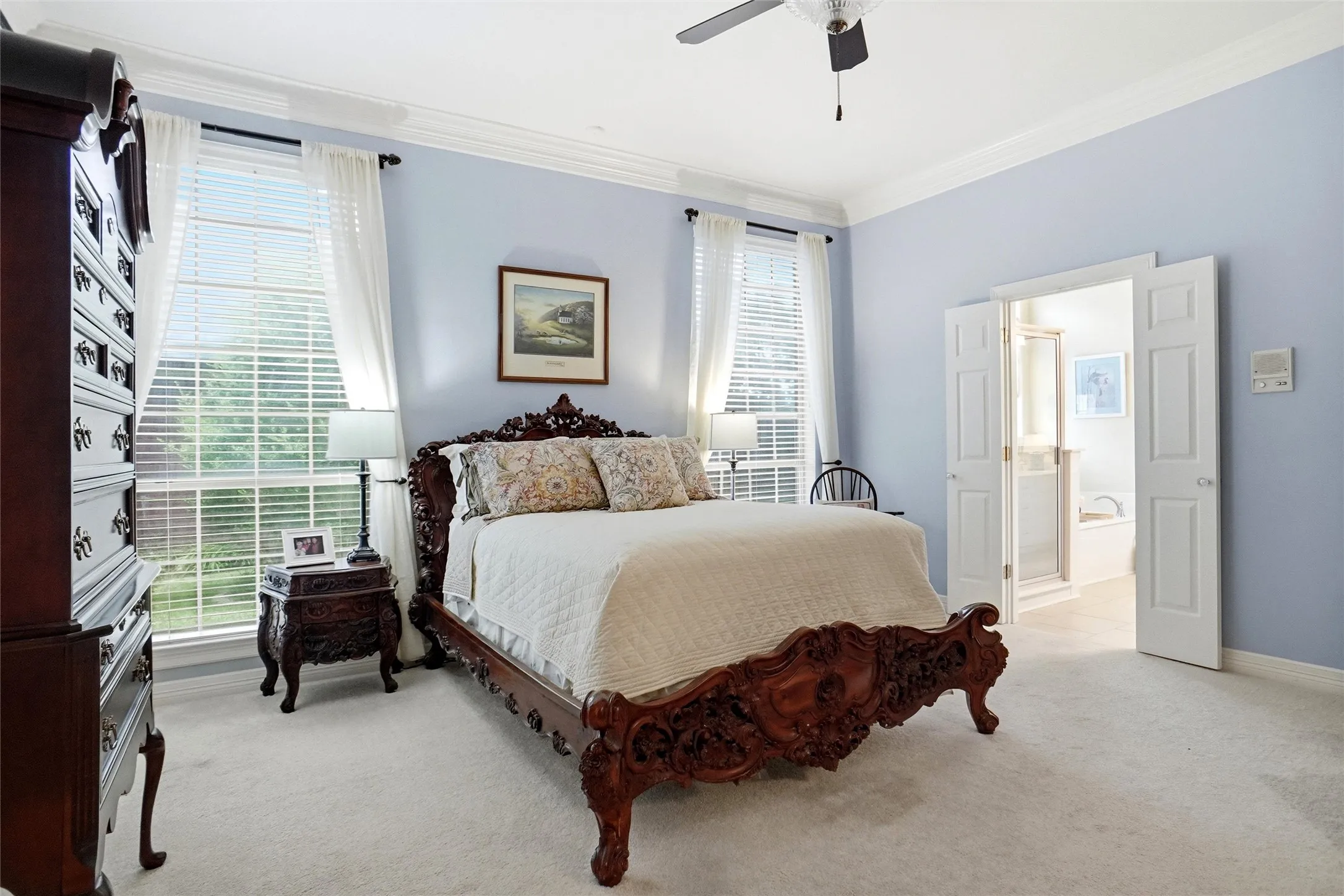 A true retreat separated from the other bedrooms with wood blinds and natural light.