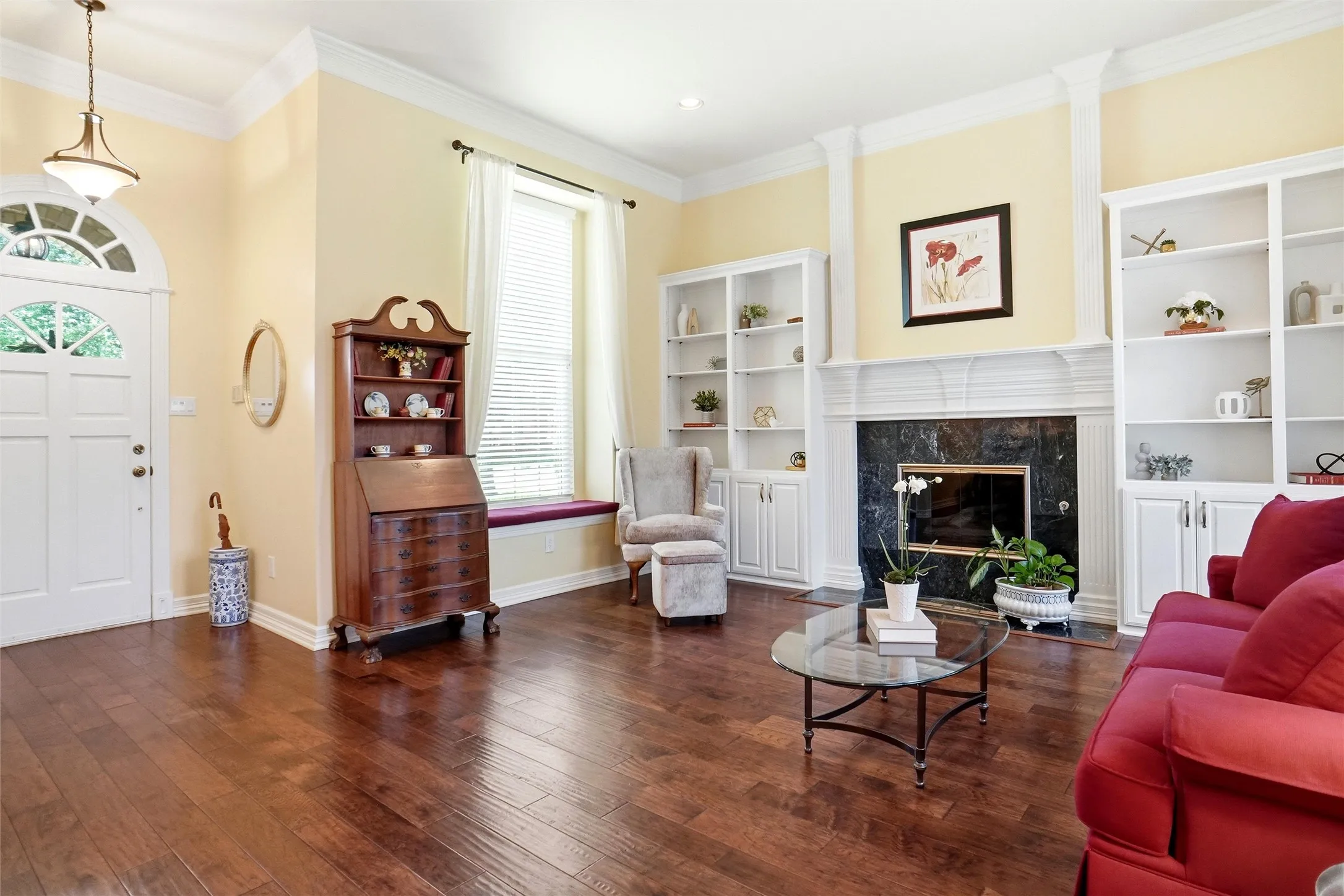 Crown molding and wood floors and coat closet
