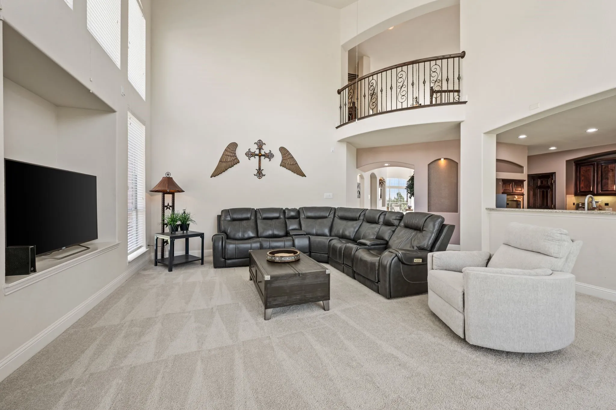 Open-concept design seamlessly connects the family room to the kitchen for effortless entertaining.  This room is also prewired for 5.1 surround sound!