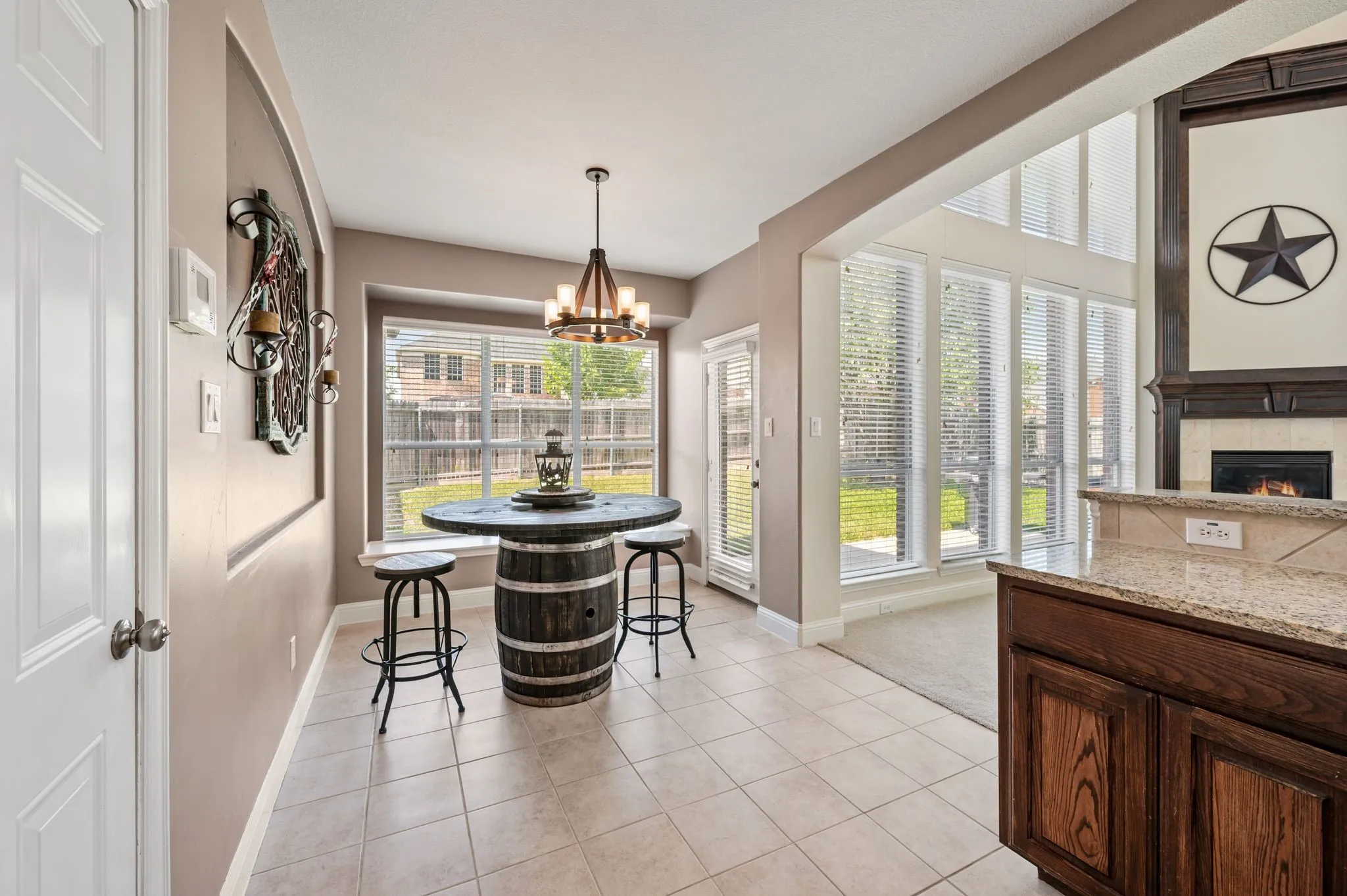 Sunny breakfast nook is the perfect spot to enjoy casual meals while overlooking the backyard.