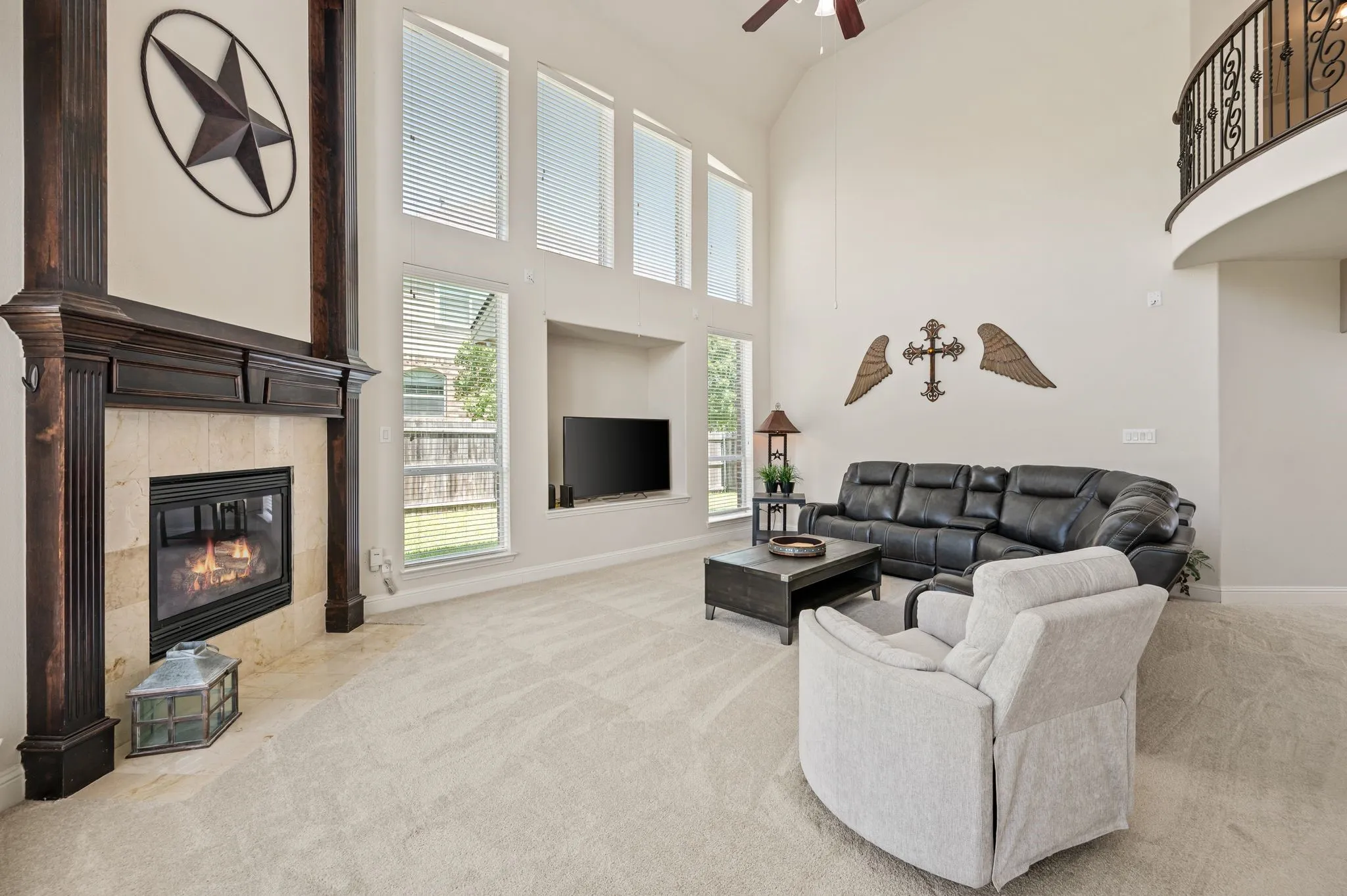 Another stunning perspective of the spacious living area, perfect for relaxing or hosting family & friends. Noticed the recessed TV nook, thus making your living area larger!