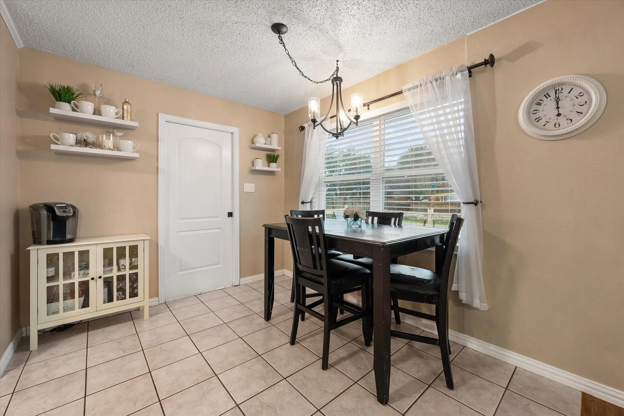 Dining room is conveniently located off of the kitchen and living room.