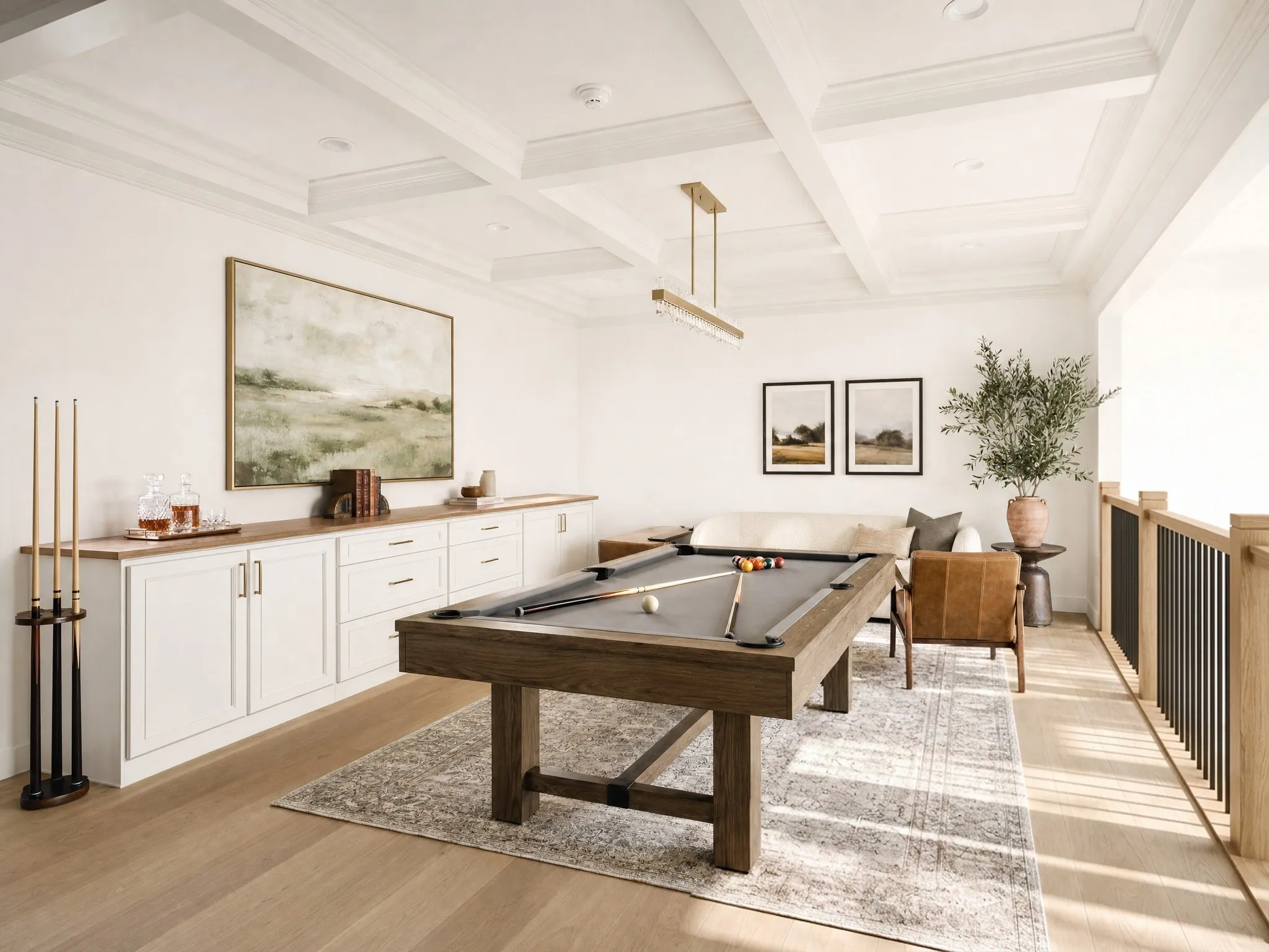 Spacious recreational area featuring a coffered ceiling, wood-finish flooring, and a built-in cabinetry unit with wood countertops