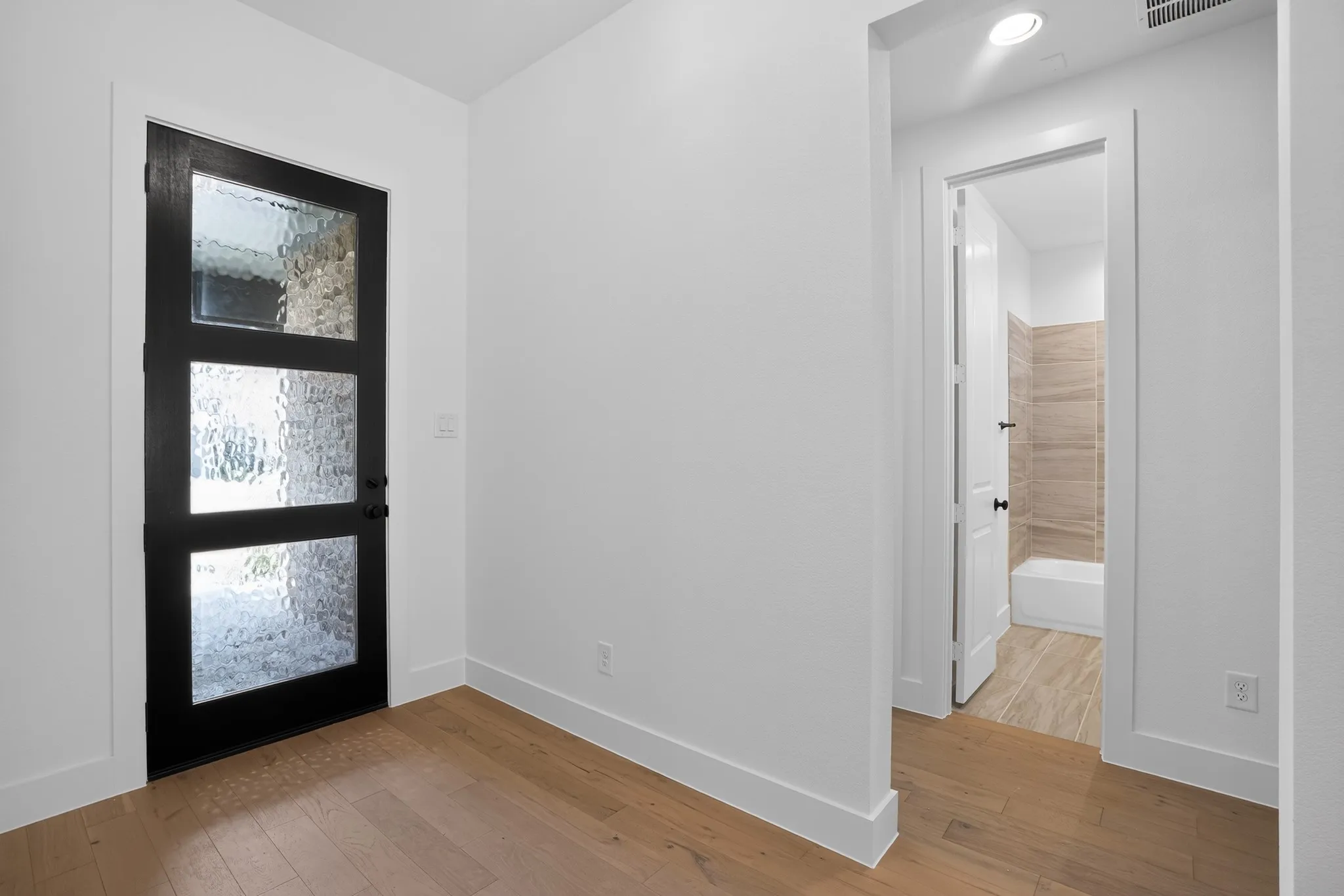 Wood-finish flooring throughout