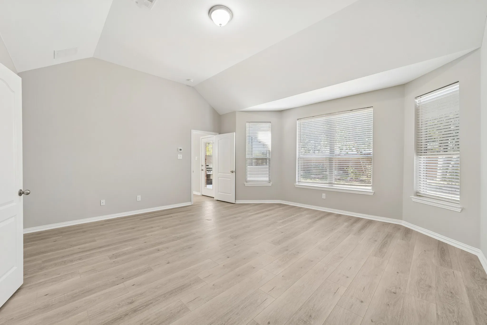 Living room with vaulted ceiling