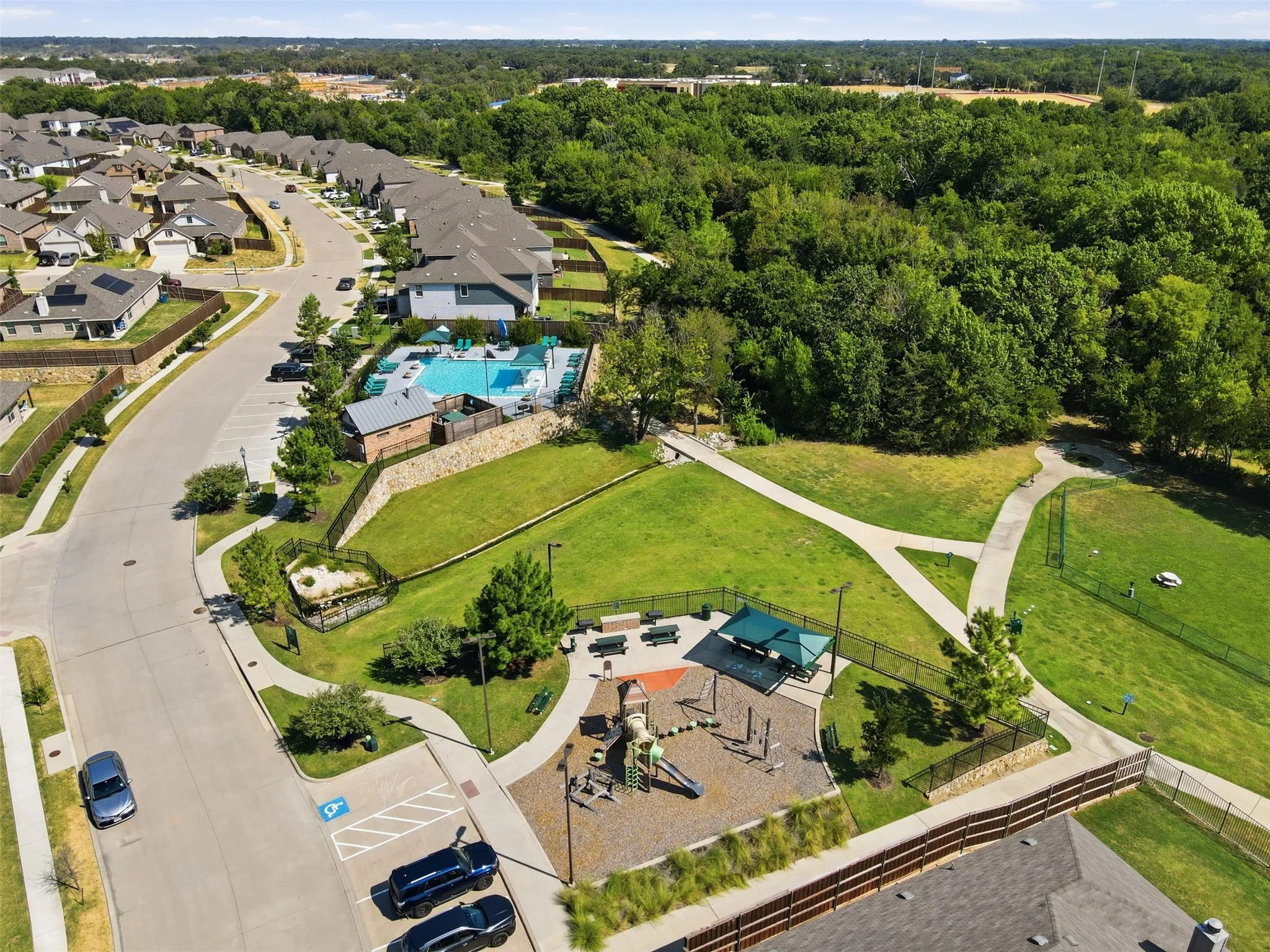 Community pool, playground and dog park conveniently located steps from home. (3 doors down)