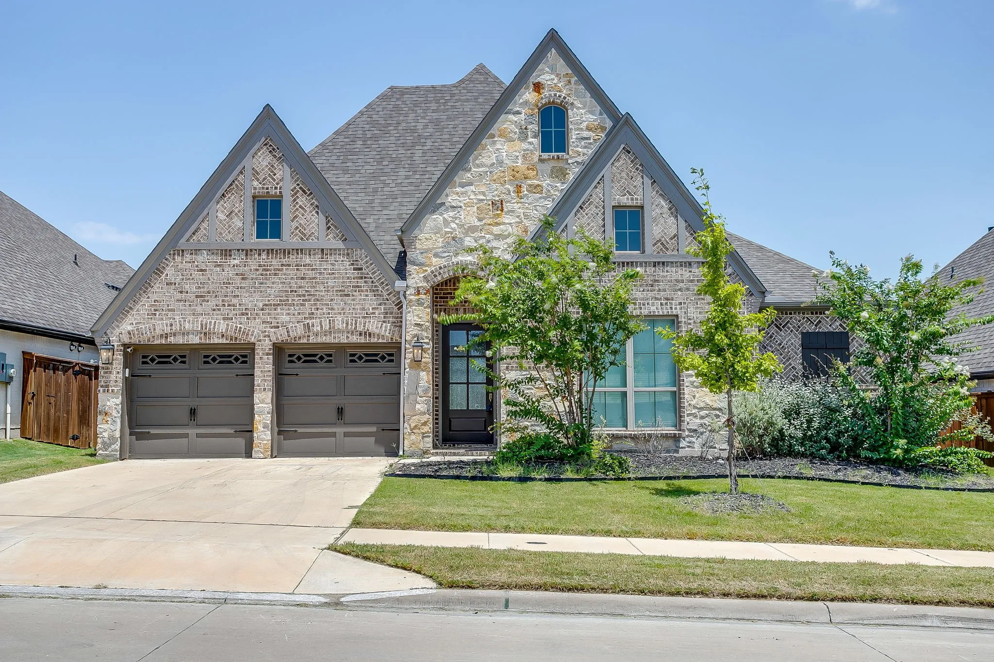 Elegant exterior featuring a combination of natural stone and brickwork
