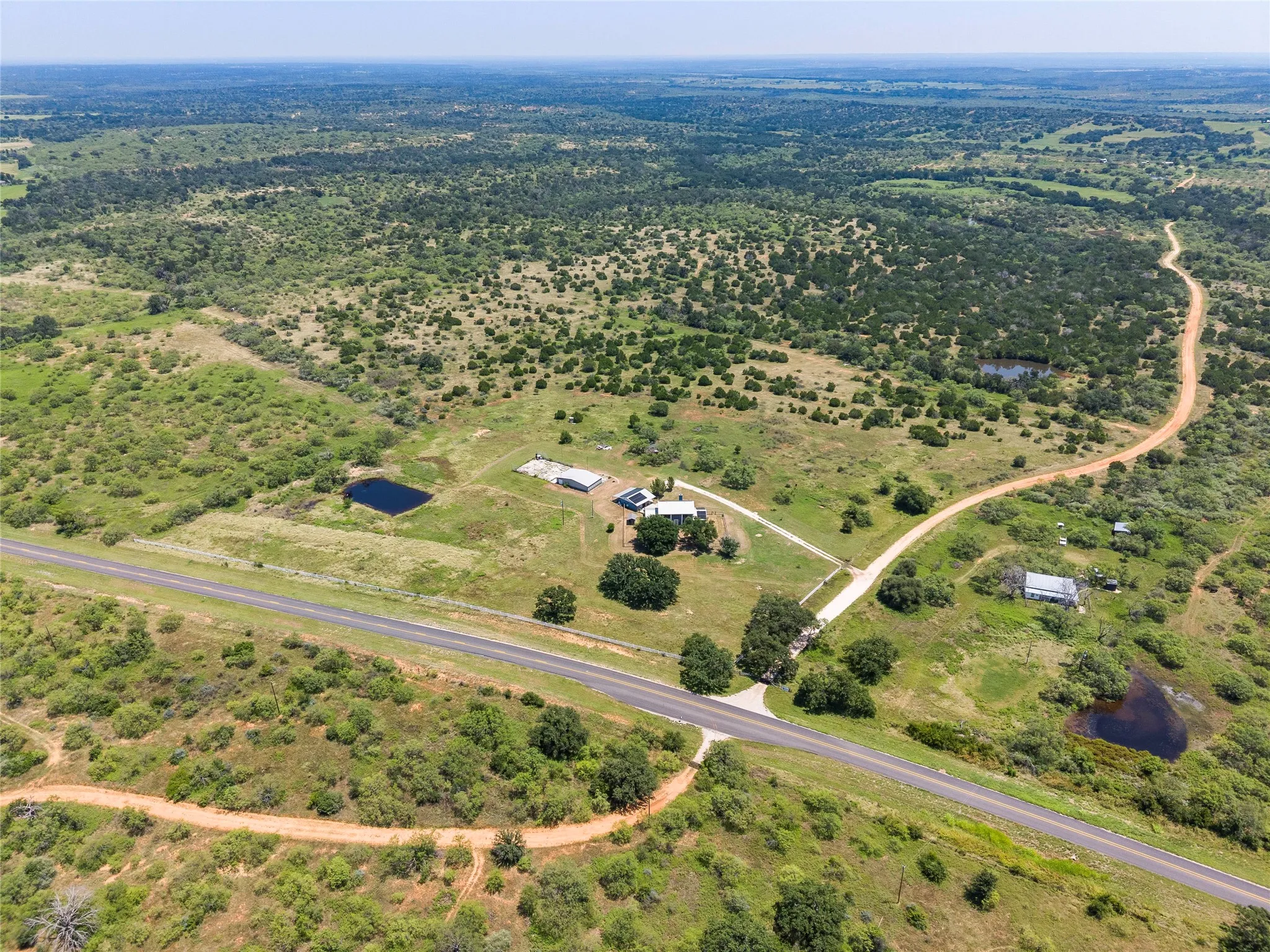 Breathtaking Hill Country views and unrestricted acreage make this property a rare find for buyers seeking space and privacy