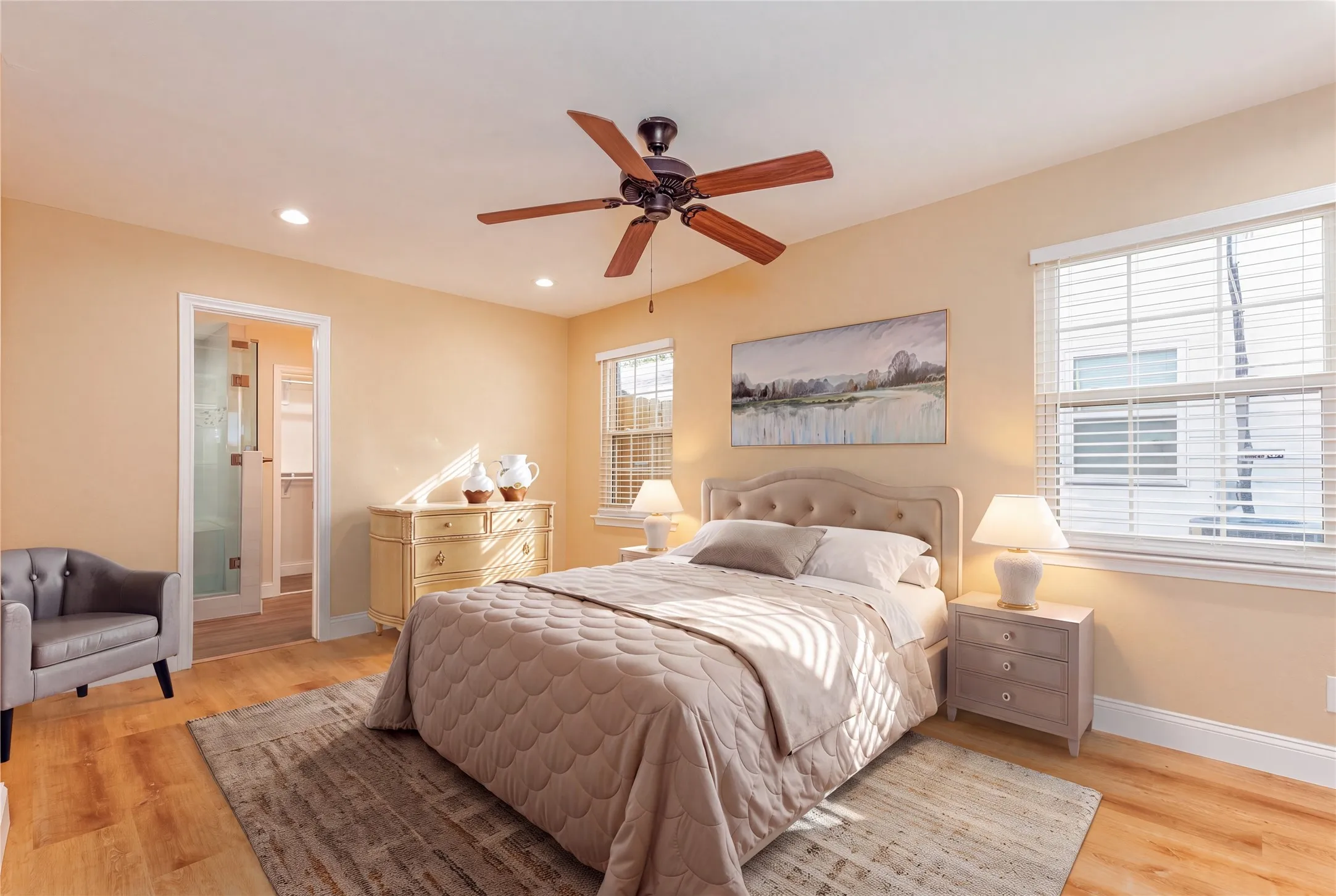 LVP flooring, recessed lighting, and a ceiling fan with light fixture