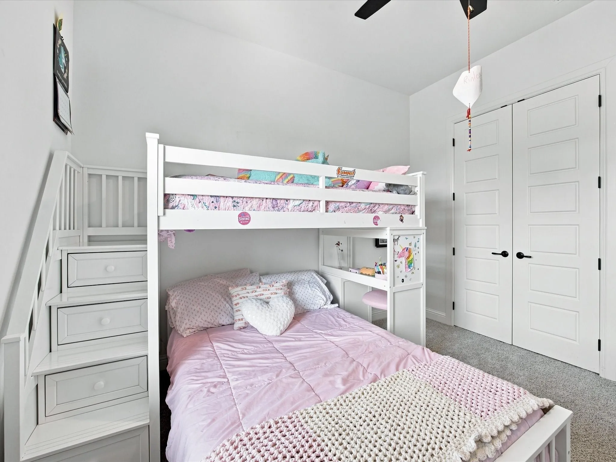 Built-in bunk bed with integrated staircase storage