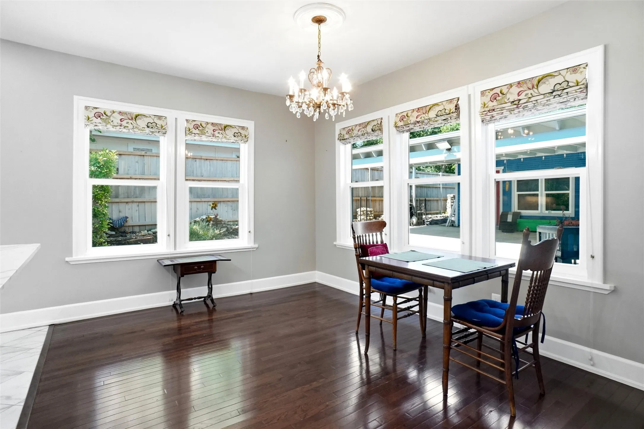Interior space featuring dark wood-finish flooring and light gray walls