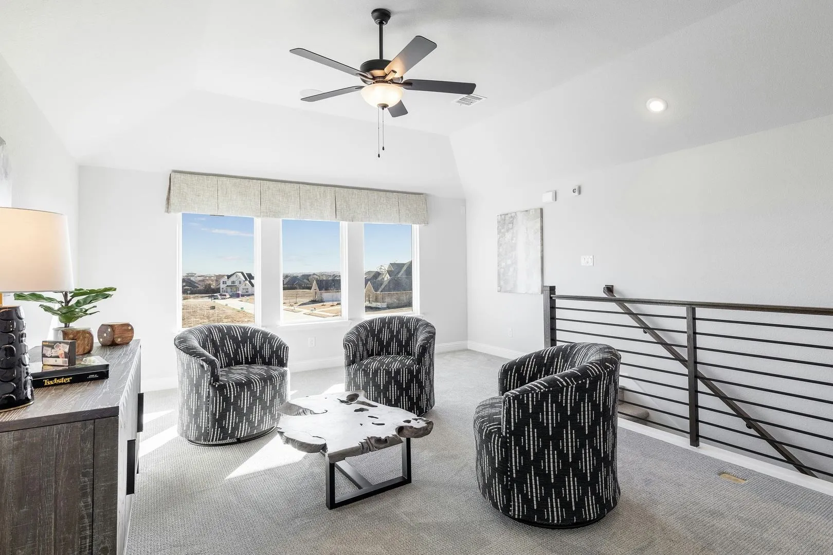 Gameroom and Stairs of Kentsdale Farms home in DeSoto, TX by Kindred Homes