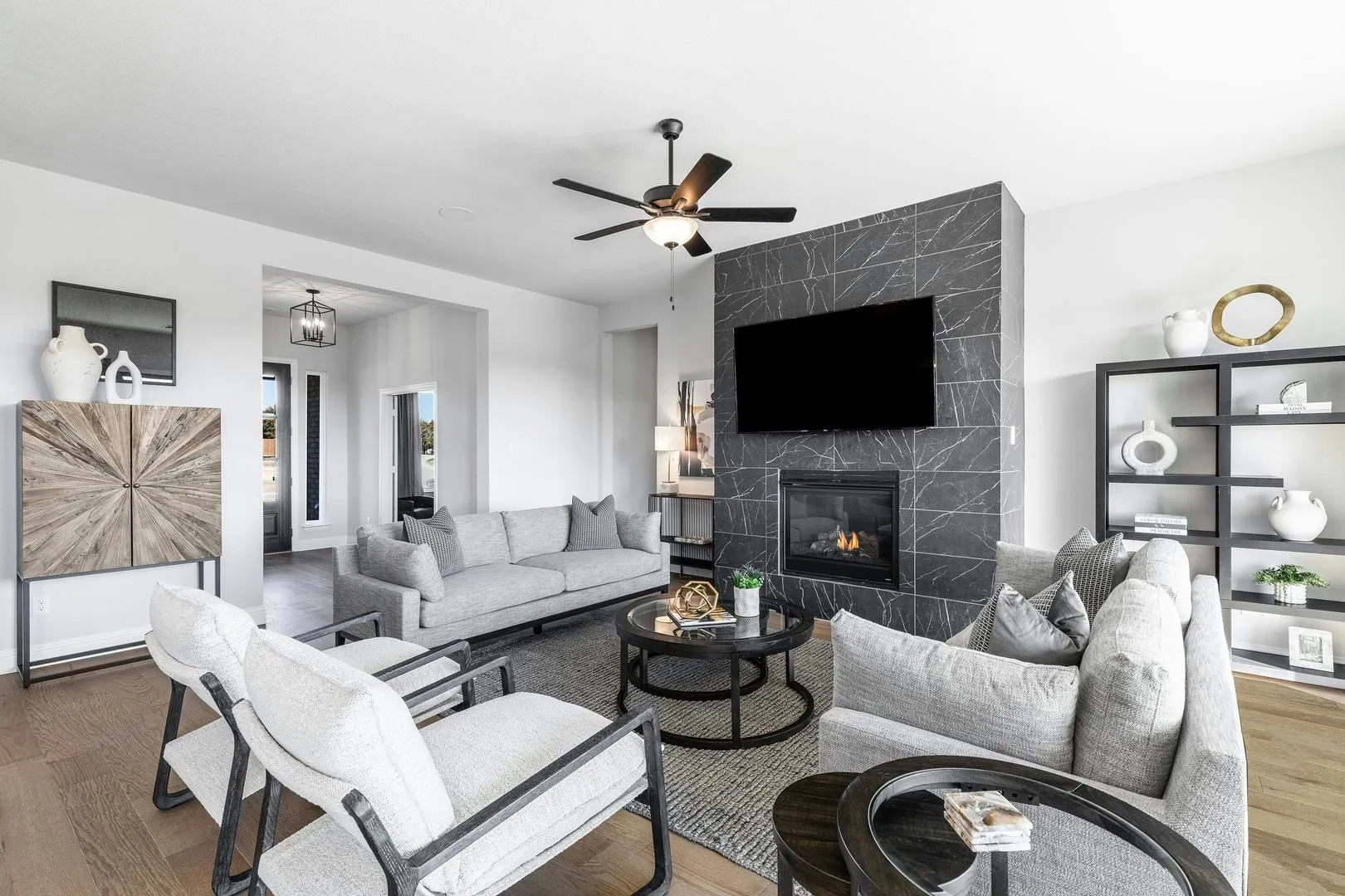 Living room and entryway of Kentsdale Farms home in DeSoto, TX by Kindred Homes