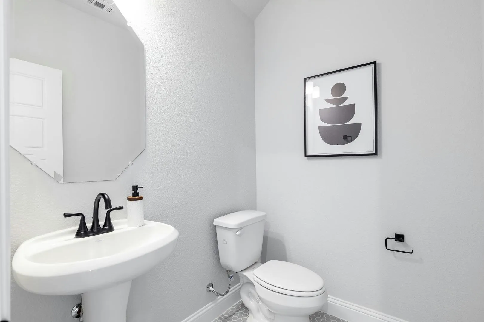 Powder Bath of Kentsdale Farms home in DeSoto, TX by Kindred Homes