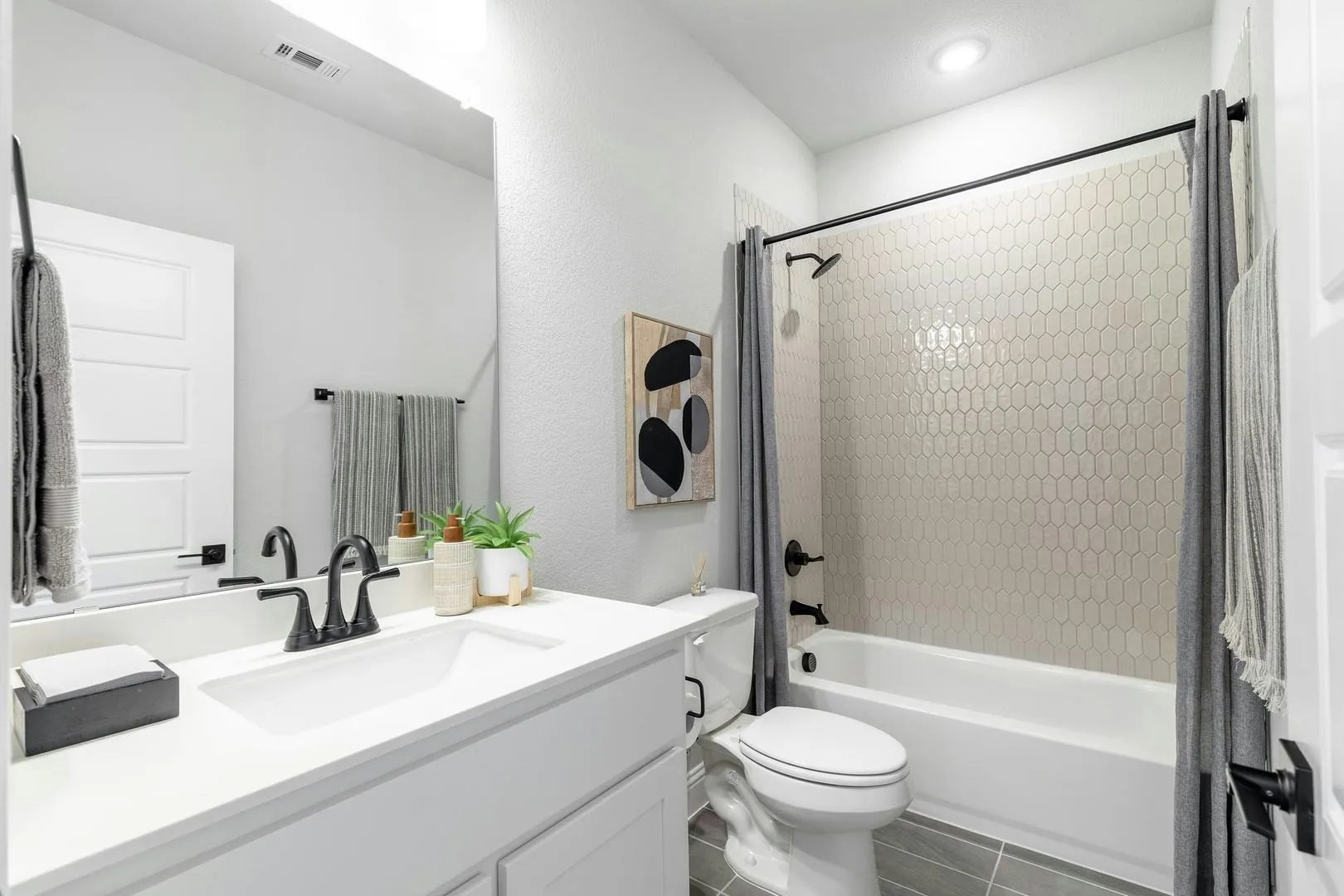 Secondary Bathroom of Kentsdale Farms home in DeSoto, TX by Kindred Homes