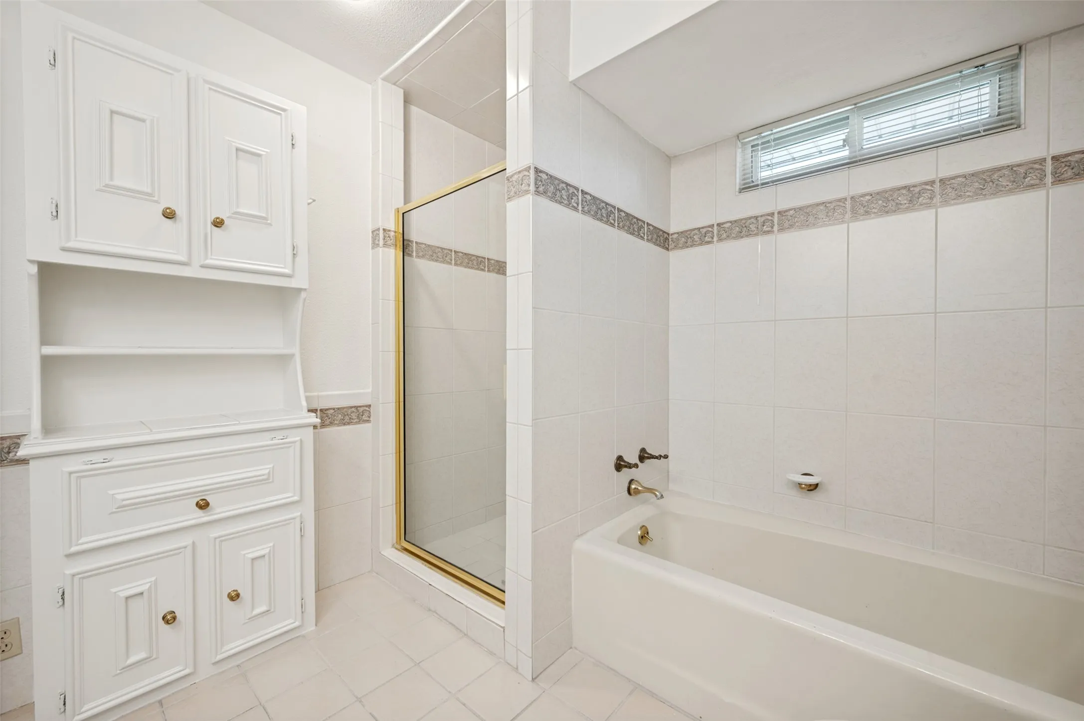 Upstairs Bath serves secondary bedrooms and has been enlarged to include a separate shower!