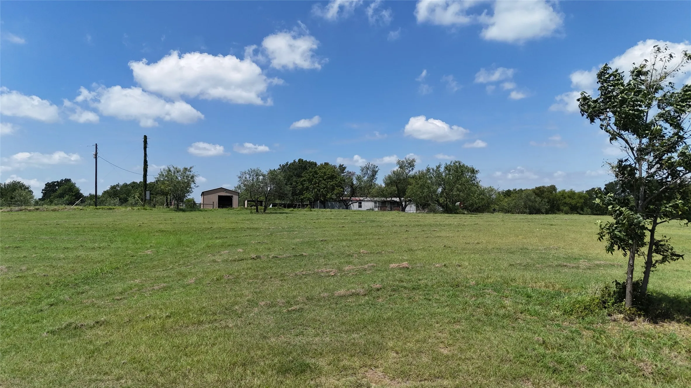 Expansive build site offering room for outdoor living and custom landscaping.