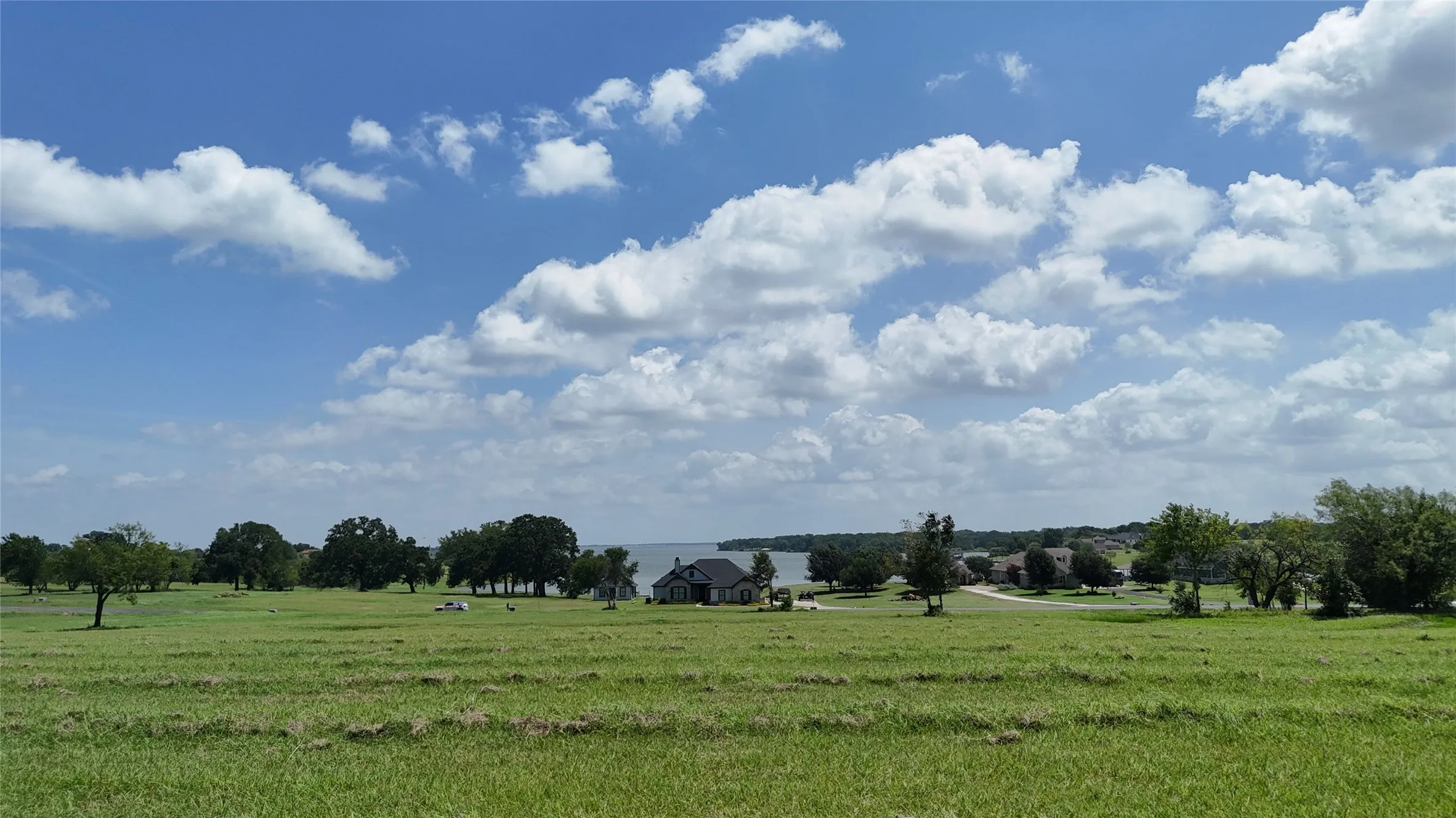 Lake-view homesite surrounded by quality custom homes and open green space.