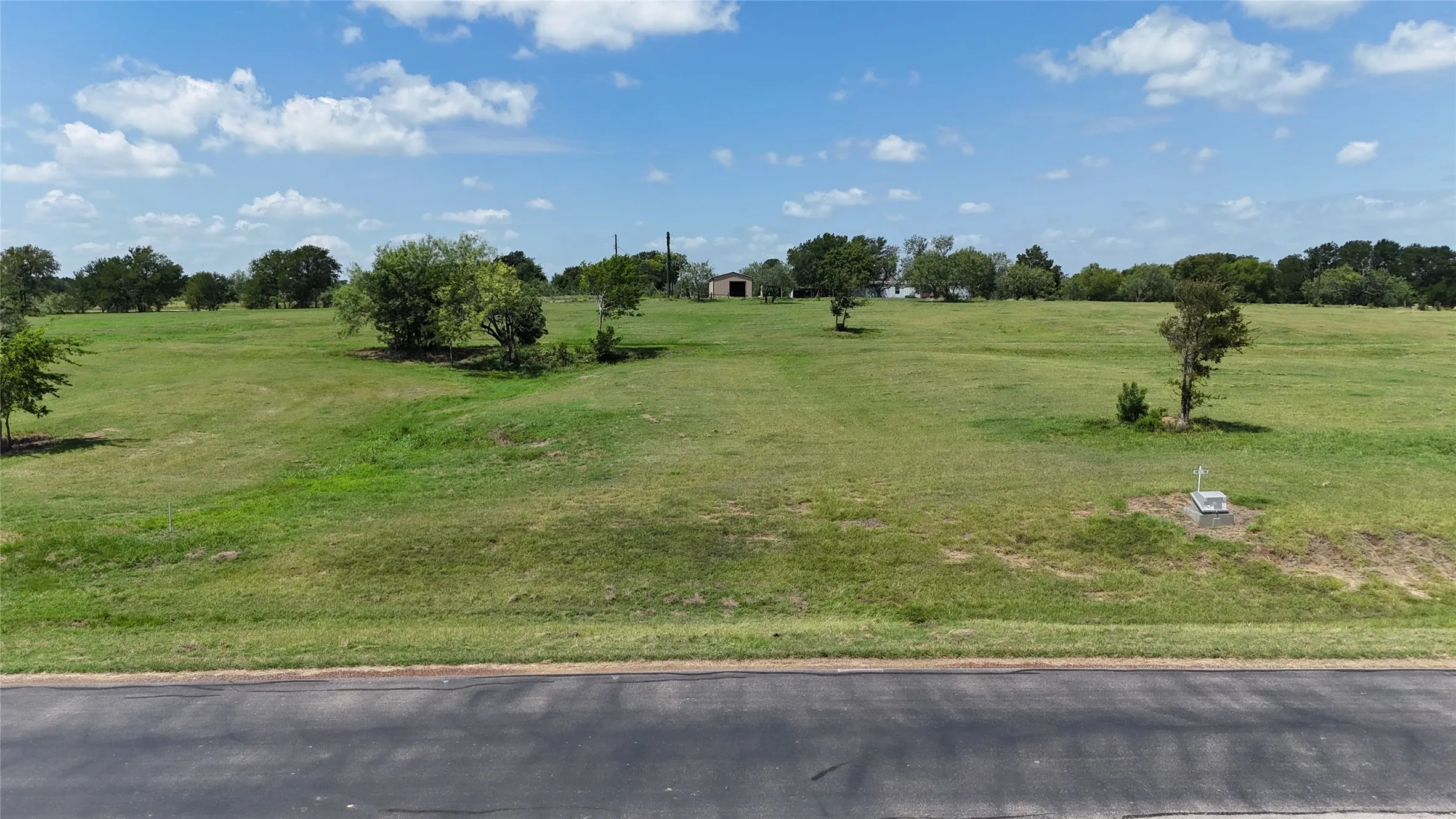 Level building site offering beautiful lake views in a gated community.