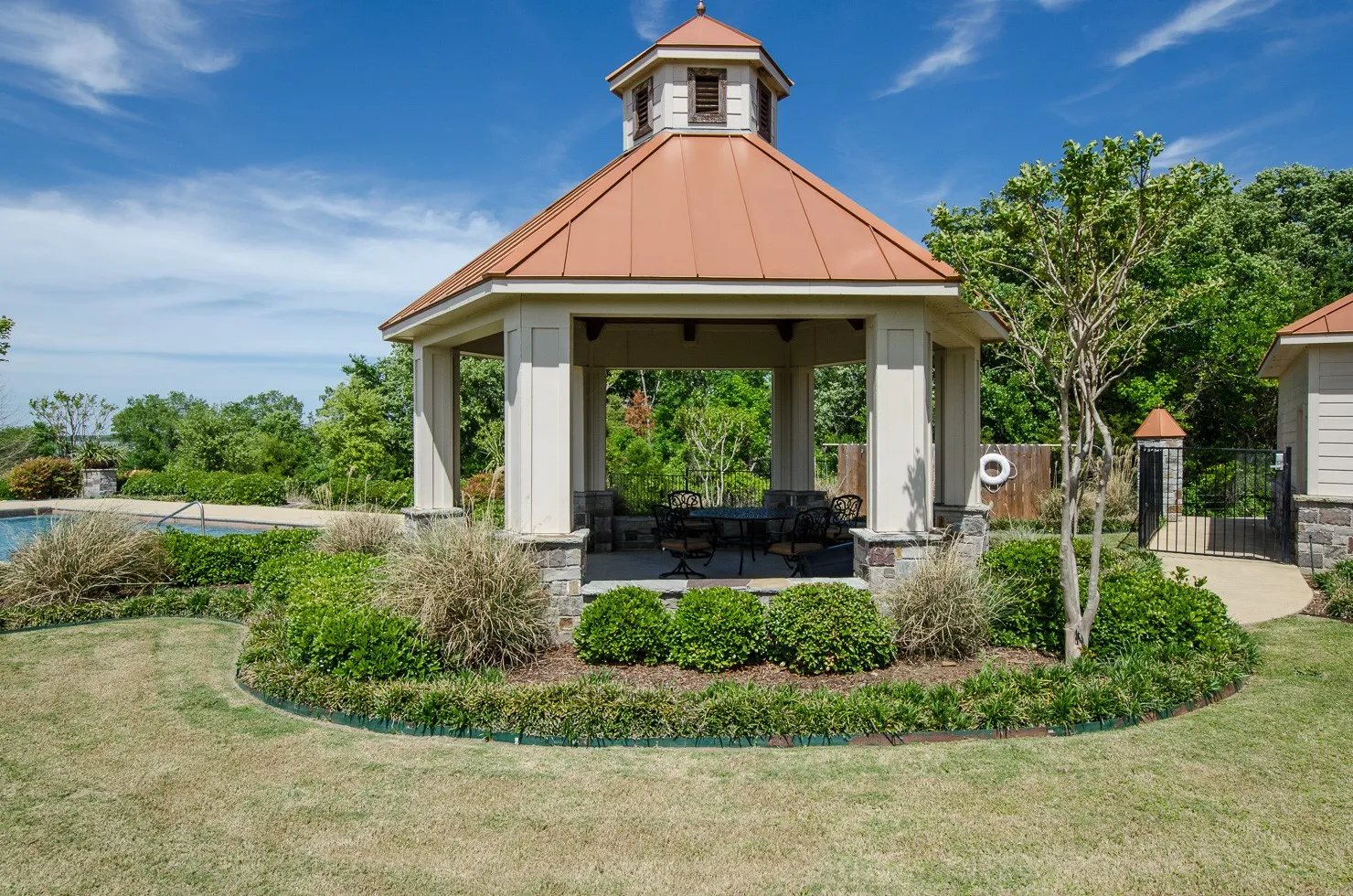 Poolside cabana creates the perfect setting for entertaining after a day on the lake.