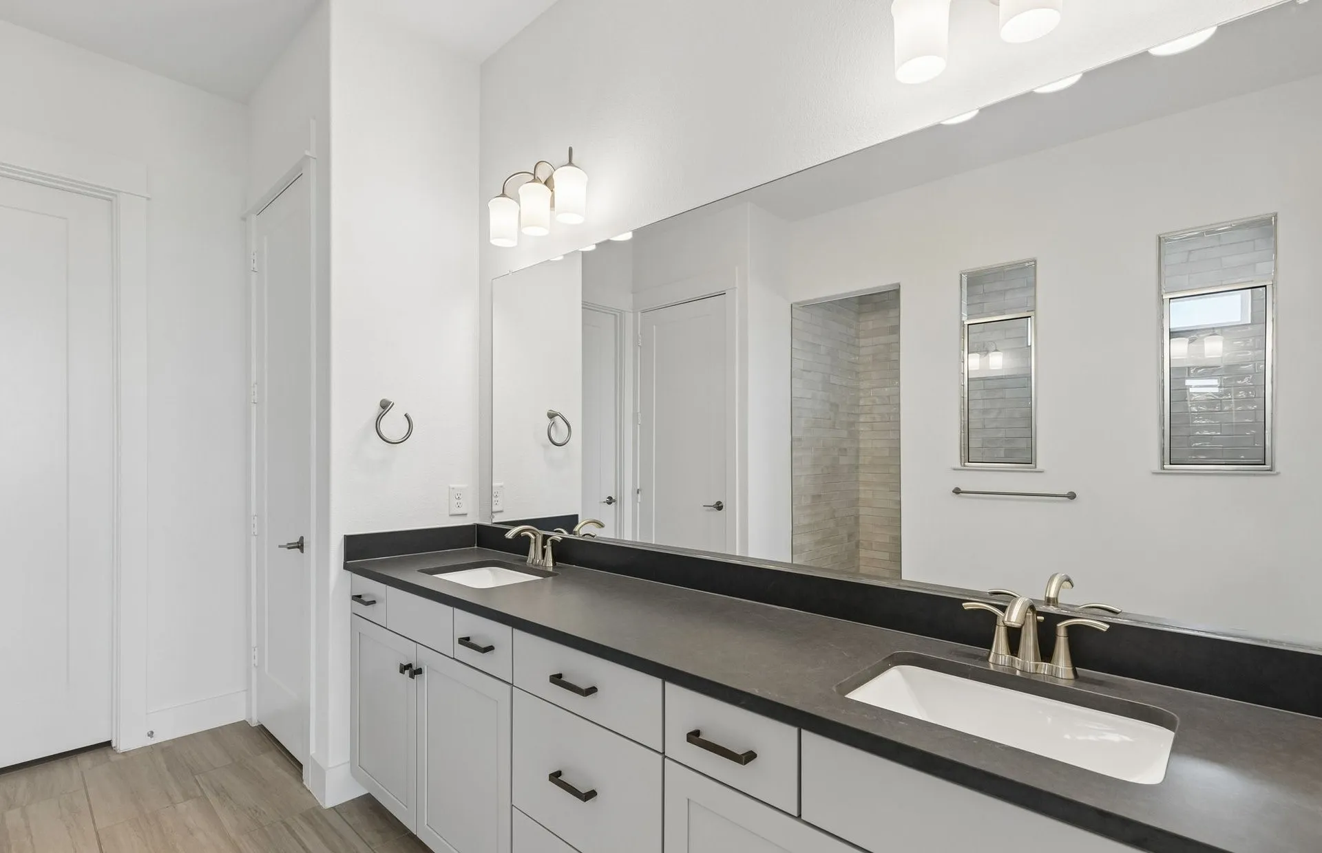 Double vanity in owner's bath