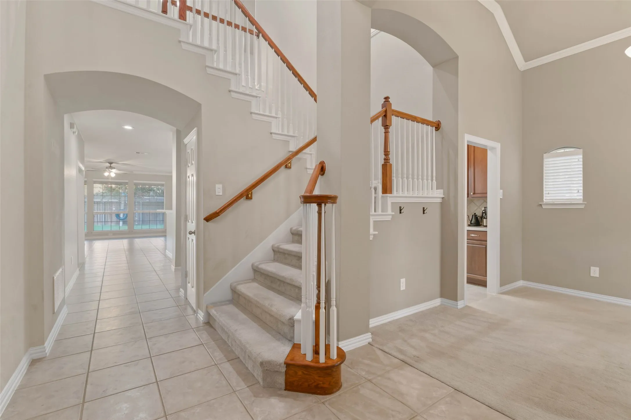 Entry moment with formal dining room to the right and living room straight ahead.