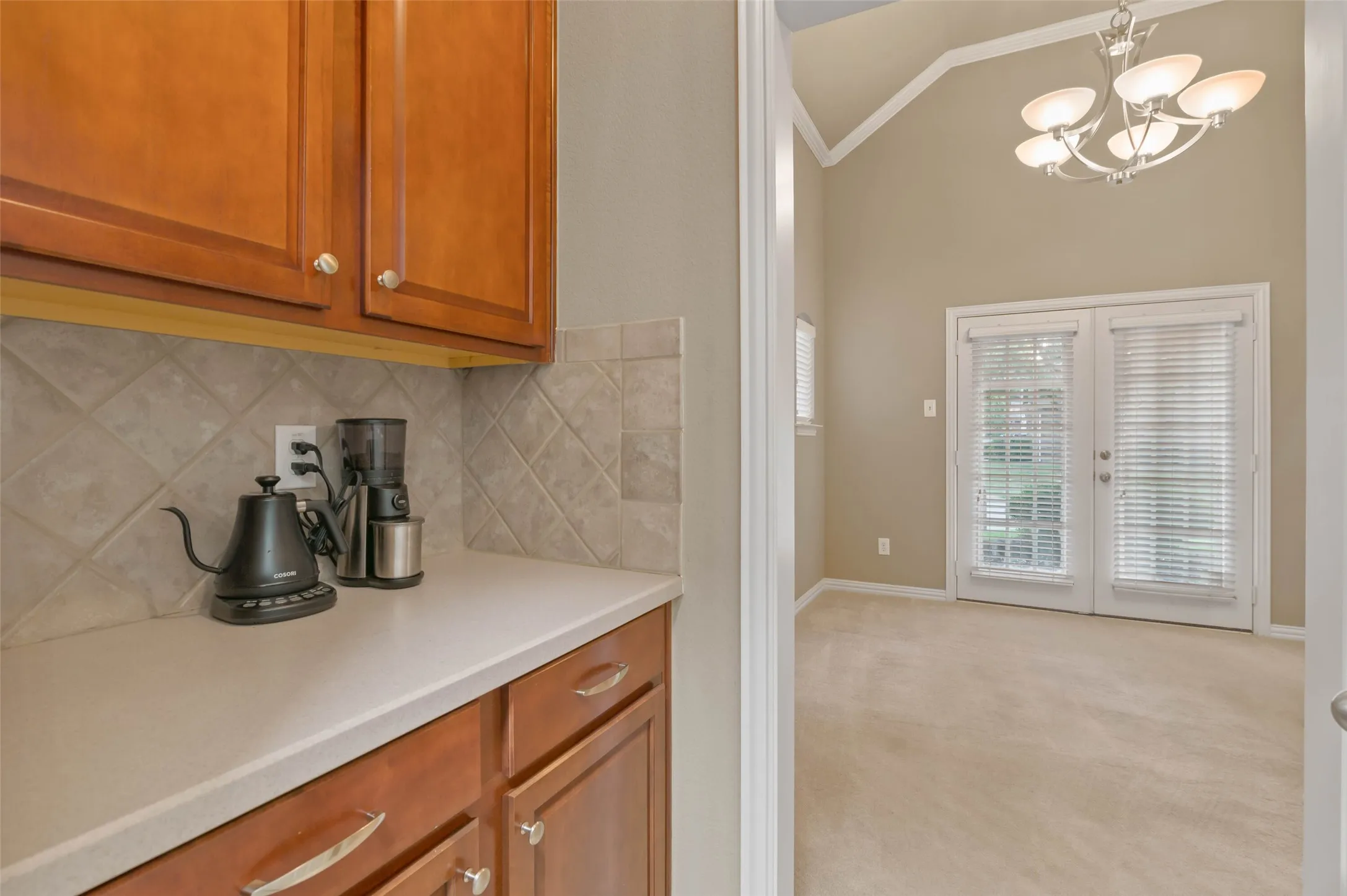 Butler's pantry, prep space or coffee bar between kitchen and dining room.