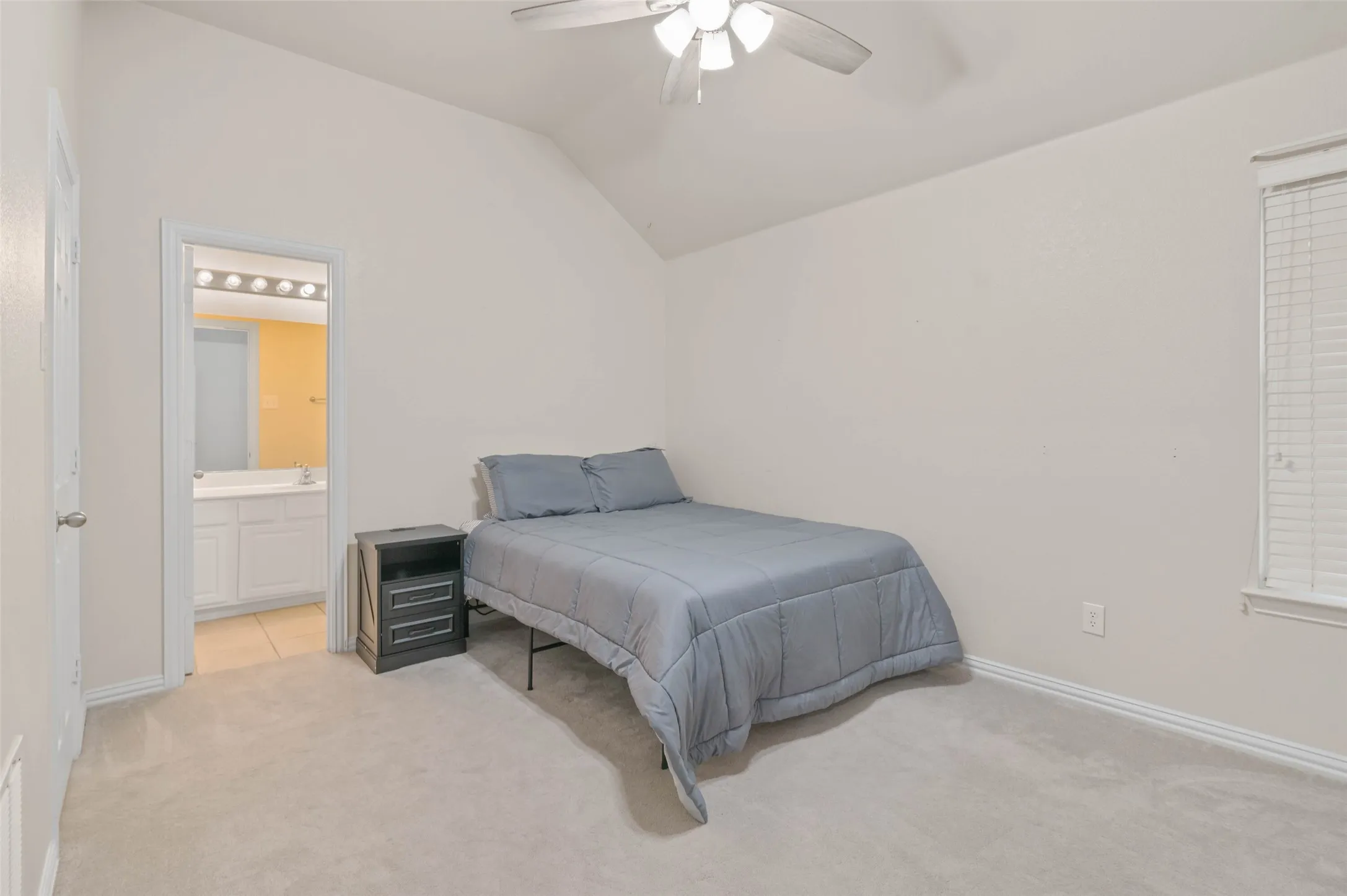 One of three upstairs bedrooms. This one has an ensuite bath.