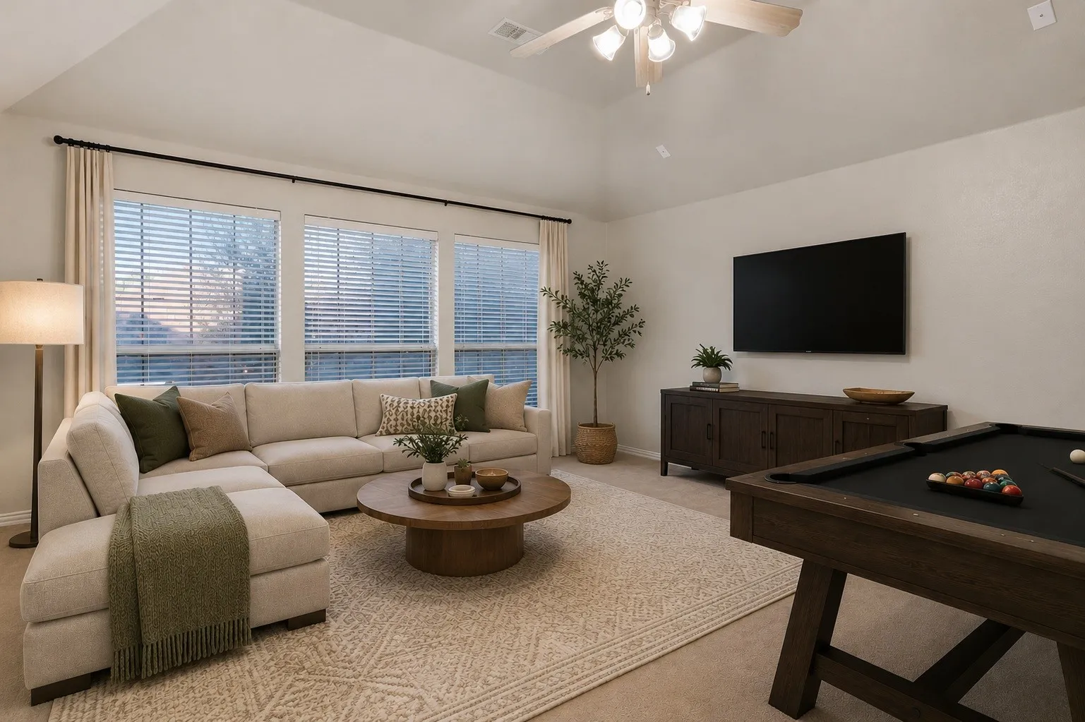 Virtually staged game room living area upstairs
