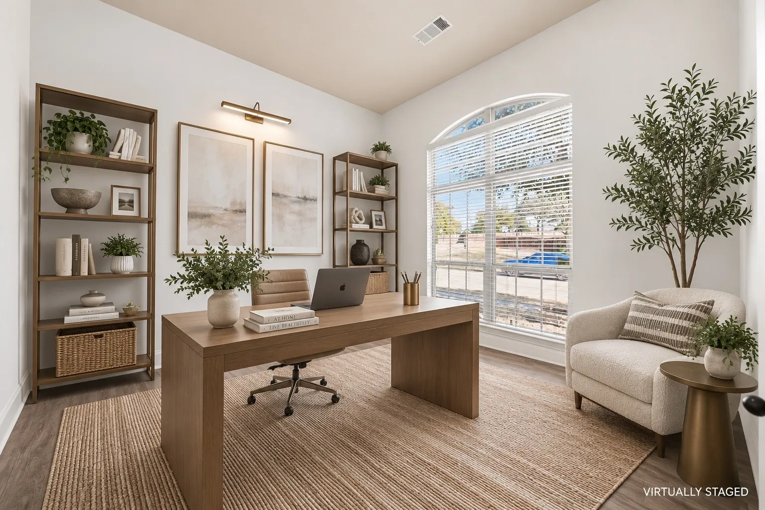 Dedicated room featuring an arched window, wood-finish flooring, and built-in shelving
