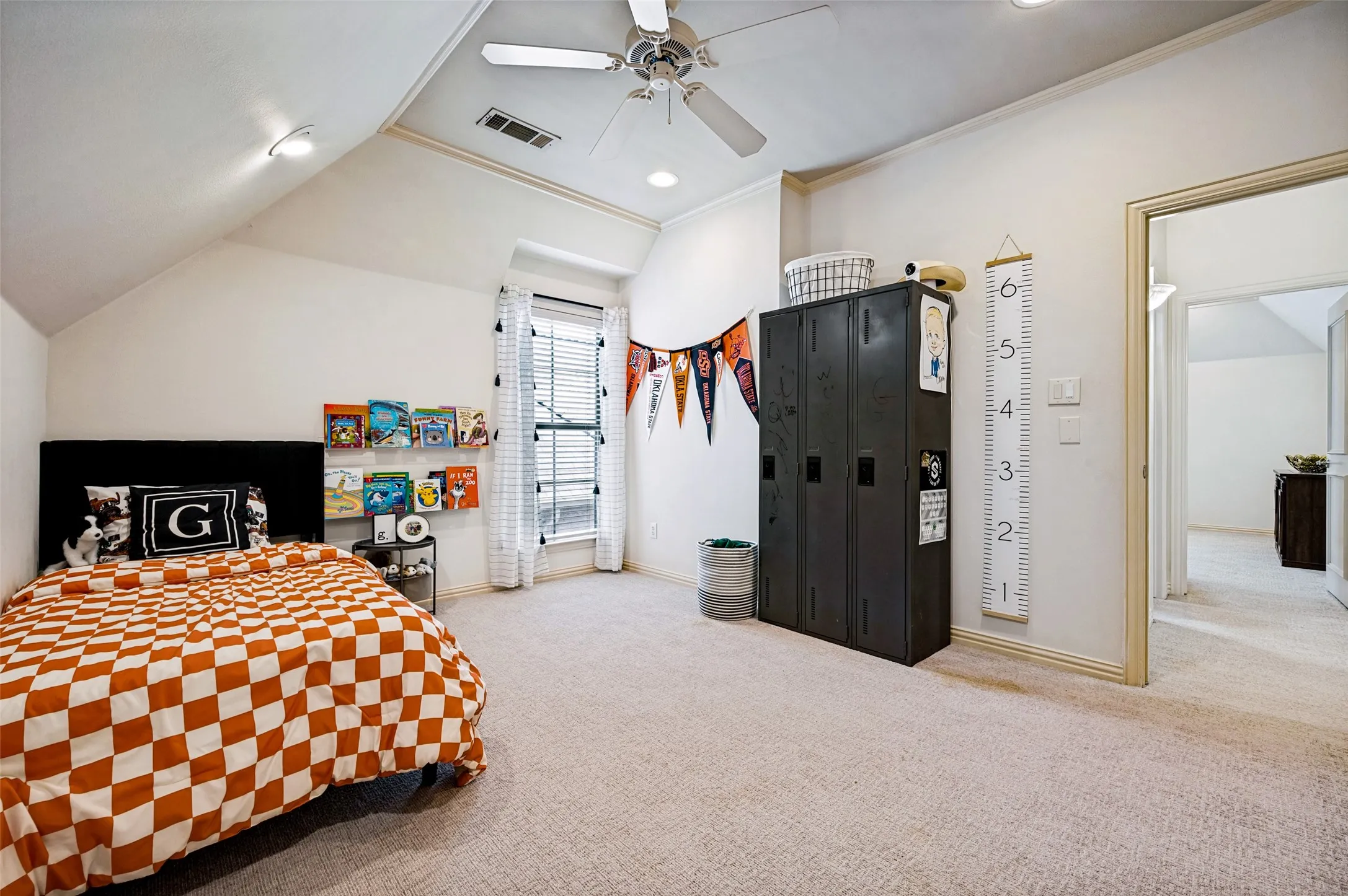 Carpeted room with a ceiling fan, recessed lighting, and a window with blinds