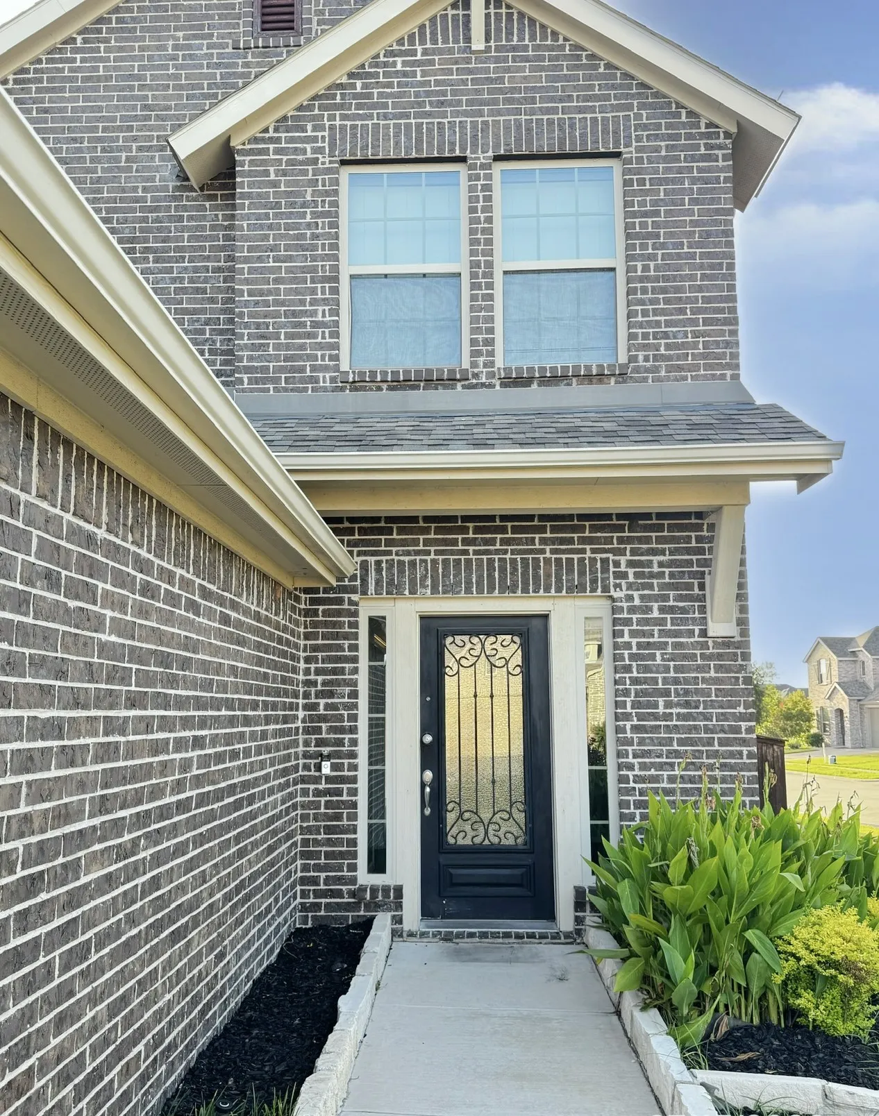 Brick exterior with gabled architectural details