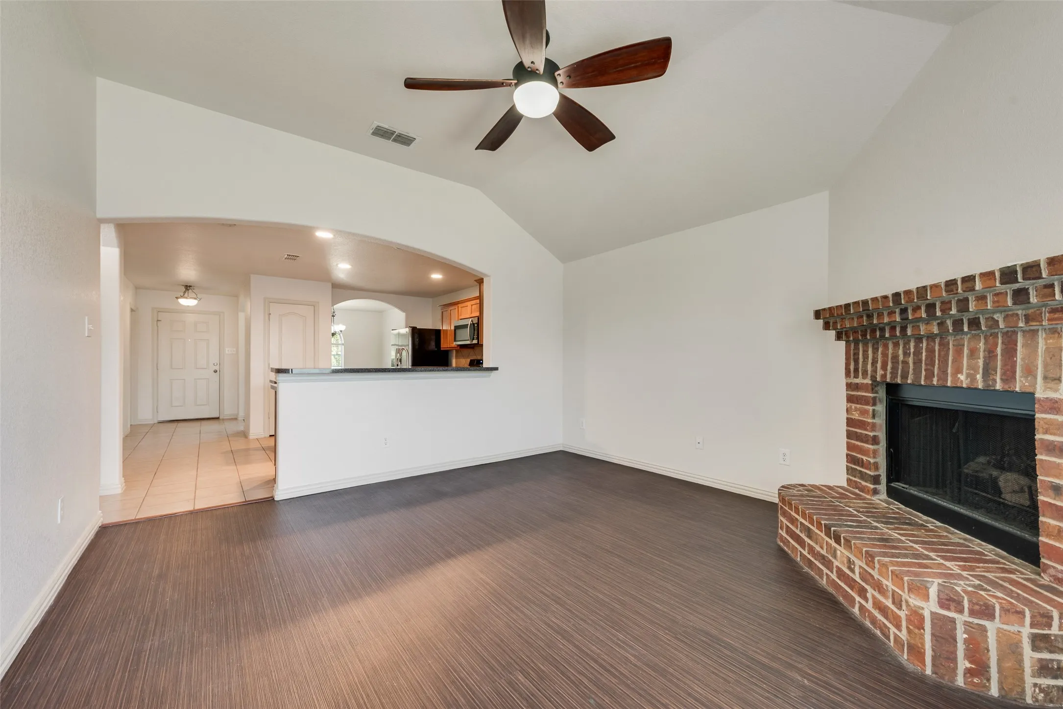 Living room looking into kitchen