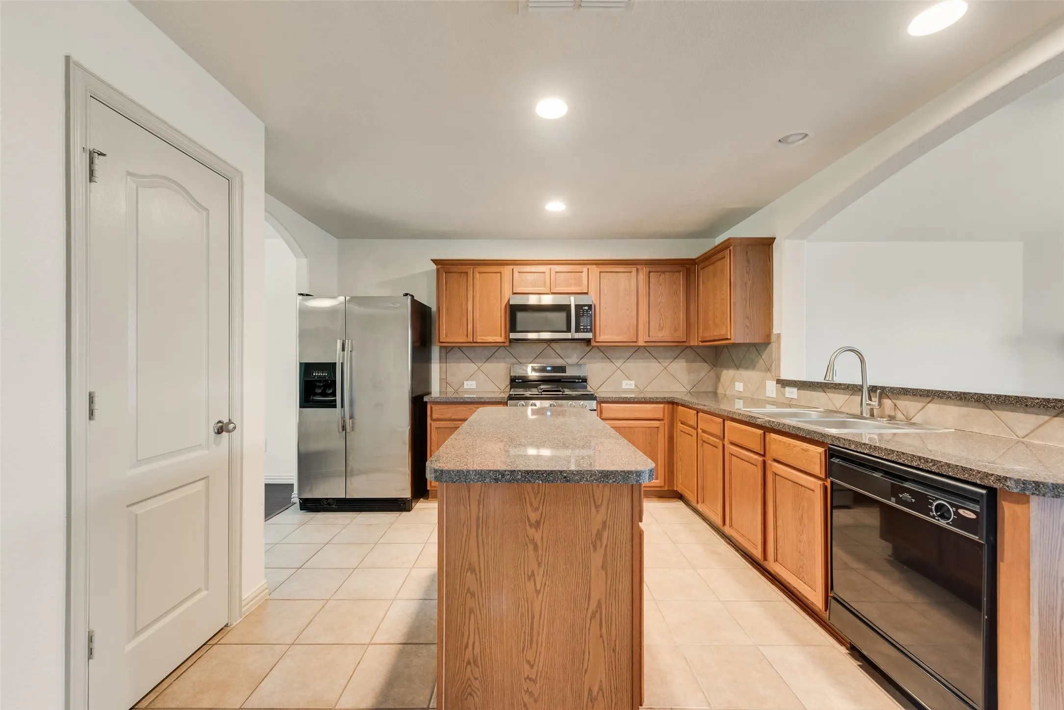 New gas range and microwave; refrigerator is included