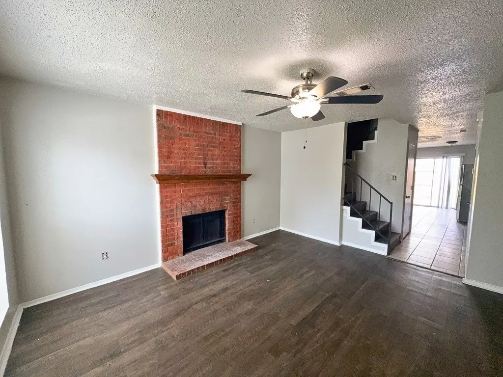 Living room with wood-burning fireplace